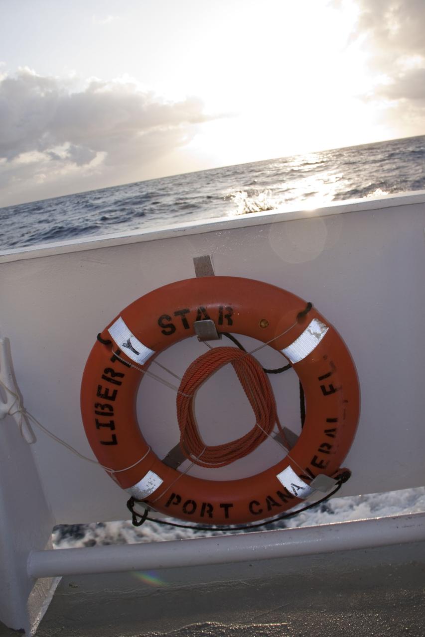 CAPE CANAVERAL, Fla. -- A flotation device is secured to the railing of Liberty Star, one of NASA's solid rocket booster retrieval ships. The ship has set sail to be in position in the Atlantic Ocean to recover the right spent booster that splashed down after space shuttle Discovery's final launch. The shuttle’s two solid rocket booster casings and associated flight hardware are recovered in the Atlantic Ocean after every launch by Freedom Star and Liberty Star. The boosters impact the Atlantic about seven minutes after liftoff and the retrieval ships are stationed about 10 miles from the impact area at the time of splashdown. After the spent segments are processed, they will be transported to Utah, where they will be refurbished and stored, if needed. Photo credit: NASA/Frank Michaux