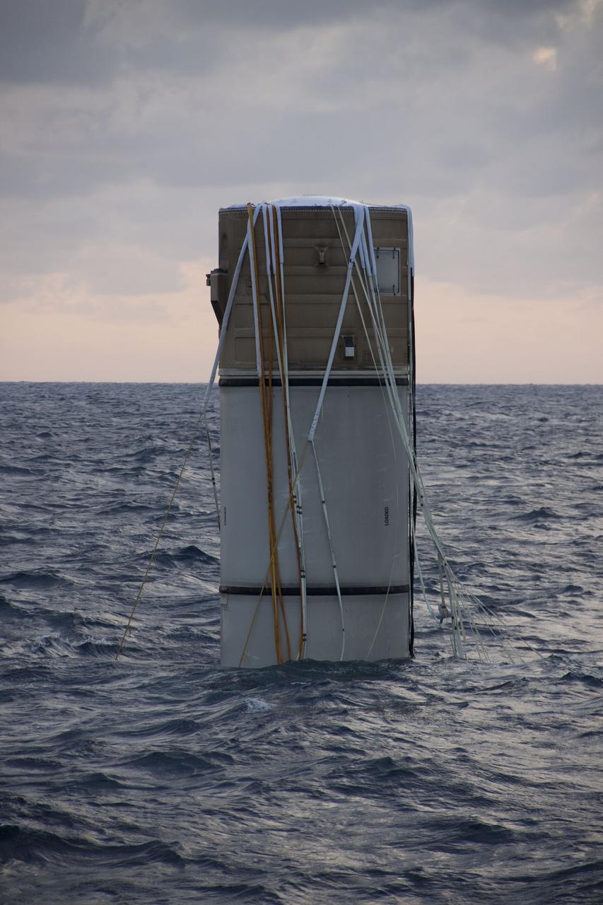CAPE CANAVERAL, Fla. -- The right spent booster from shuttle Discovery's final launch is seen bobbing in the Atlantic Ocean. Crew members from Liberty Star, one of NASA's solid rocket booster retrieval ships, will recover the parachute and tow the booster back to Port Canaveral in Florida.          The shuttle’s two solid rocket booster casings and associated flight hardware are recovered in the Atlantic Ocean after every launch by Freedom Star and Liberty Star. The boosters impact the Atlantic about seven minutes after liftoff and the retrieval ships are stationed about 10 miles from the impact area at the time of splashdown. After the spent segments are processed, they will be transported to Utah, where they will be refurbished and stored, if needed. Photo credit: NASA/Frank Michaux