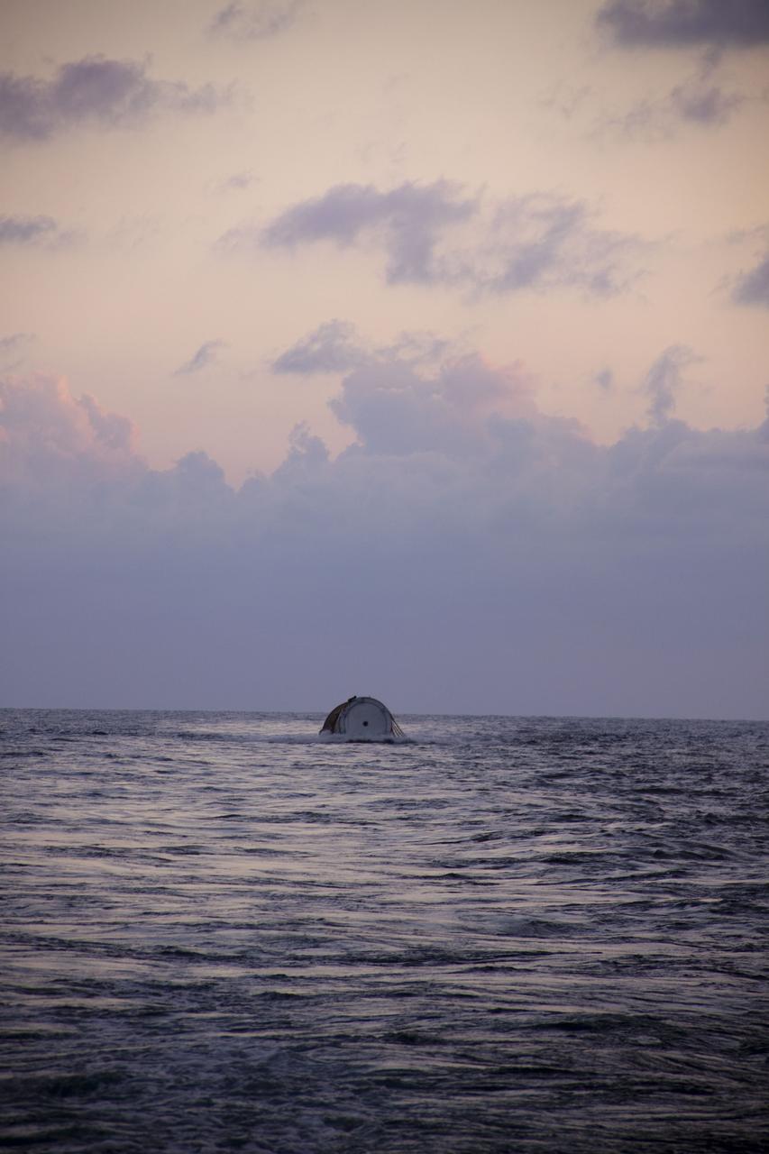 CAPE CANAVERAL, Fla. -- Liberty Star, one of NASA's solid rocket booster retrieval ships, tows the right spent booster from space shuttle Discovery's final launch, to Port Canaveral in Florida.                  The shuttle's two solid rocket booster casings and associated flight hardware are recovered in the Atlantic Ocean after every launch by Freedom Star and Liberty Star. The boosters impact the Atlantic about seven minutes after liftoff and the retrieval ships are stationed about 10 miles from the impact area at the time of splashdown. After the spent segments are processed, they will be transported to Utah, where they will be refurbished and stored, if needed. Photo credit: NASA/Frank Michaux