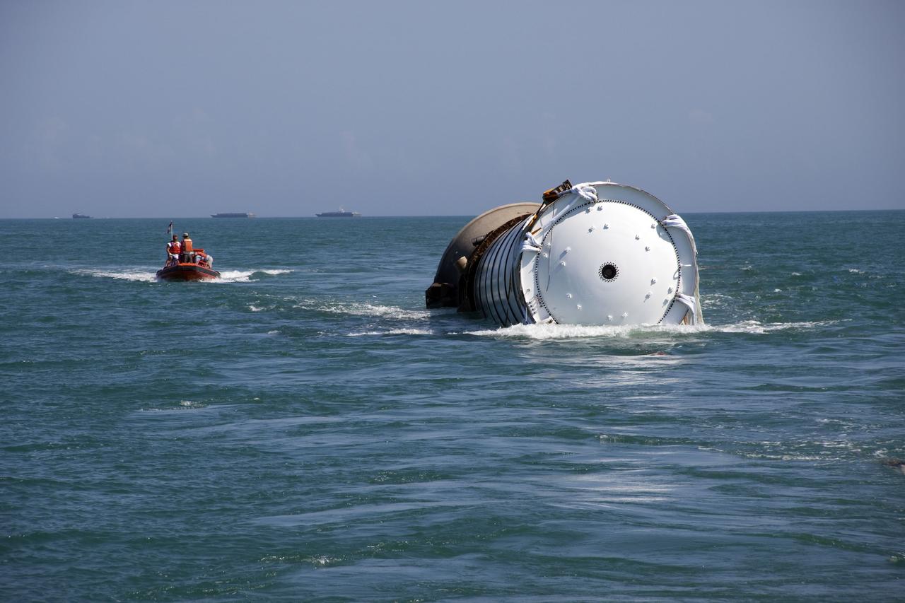 CAPE CANAVERAL, Fla. -- Liberty Star, one of NASA's solid rocket booster retrieval ships, tows the right spent booster from space shuttle Discovery's final launch, to Port Canaveral in Florida.                  The shuttle's two solid rocket booster casings and associated flight hardware are recovered in the Atlantic Ocean after every launch by Freedom Star and Liberty Star. The boosters impact the Atlantic about seven minutes after liftoff and the retrieval ships are stationed about 10 miles from the impact area at the time of splashdown. After the spent segments are processed, they will be transported to Utah, where they will be refurbished and stored, if needed. Photo credit: NASA/Frank Michaux