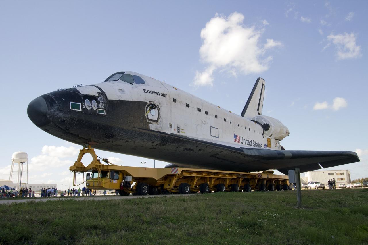 CAPE CANAVERAL, Fla. -- At NASA’s Kennedy Space Center in Florida, space shuttle Endeavour is secured to a transporter for its move, or "rollover" from Orbiter Processing Facility-2 to the Vehicle Assembly Building (VAB). In the VAB, Endeavour will be lifted into a high bay where it will be attached to its external fuel tank and solid rocket boosters for its final mission, STS-134.      Endeavour and its STS-134 crew will deliver the Express Logistics Carrier-3, Alpha Magnetic Spectrometer, a high-pressure gas tank, additional spare parts for Dextre and micrometeoroid debris shields to the International Space Station. Launch is targeted for April 19 at 7:48 p.m. EDT. For more information visit, http://www.nasa.gov/mission_pages/shuttle/shuttlemissions/sts134/index.html. Photo credit: NASA/Jack Pfaller