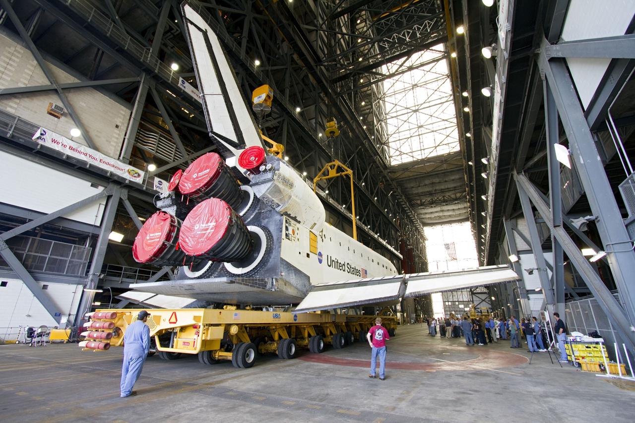 CAPE CANAVERAL, Fla. -- At NASA's Kennedy Space Center in Florida, space shuttle Endeavour is stationed in the transfer aisle of the Vehicle Assembly Building (VAB). In the VAB, Endeavour will be lifted into a high bay where it will be attached to its external fuel tank and solid rocket boosters for its final mission, STS-134.  Endeavour and its STS-134 crew will deliver the Express Logistics Carrier-3, Alpha Magnetic Spectrometer, a high-pressure gas tank, additional spare parts for Dextre and micrometeoroid debris shields to the International Space Station. Launch is targeted for April 19 at 7:48 p.m. EDT. For more information visit, http://www.nasa.gov/mission_pages/shuttle/shuttlemissions/sts134/index.html. Photo credit: NASA/Jack Pfaller