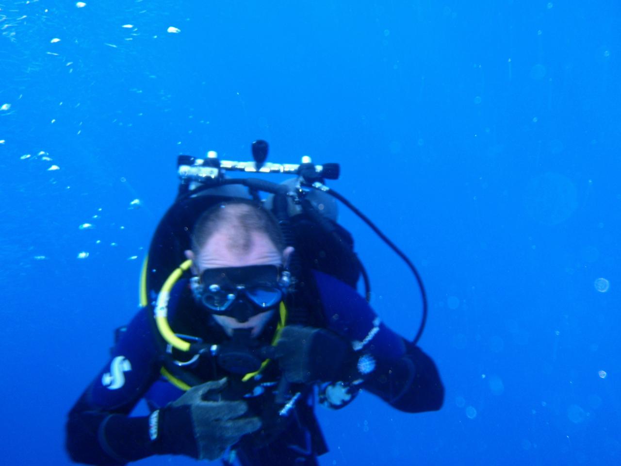 CAPE CANAVERAL, Fla. -- A diver from Liberty Star, one of NASA's solid rocket booster retrieval ships, helps retrieve a spent shuttle booster in the Atlantic Ocean off the coast of Florida. The booster, which was used during space shuttle Discovery's STS-133 launch from NASA Kennedy Space Center's Launch Pad 39A on Feb. 24, will be transported to Hangar AF at Cape Canaveral Air Force Station. The shuttle’s two solid rocket booster casings and associated flight hardware are recovered after every launch by Liberty Star and Freedom Star.          The boosters impact the Atlantic about seven minutes after liftoff and the retrieval ships are stationed about 10 miles from the impact area at the time of splashdown.  After the spent segments are processed, they will be transported to Utah, where they will be refurbished and stored, if needed. Photo credit: NASA/Frank Michaux