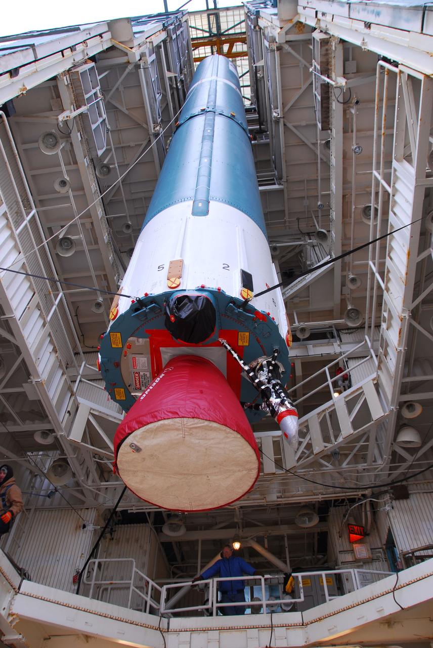 VANDENBERG AIR FORCE BASE, Calif. -- The first stage of the Delta II rocket that will carry NASA's Aquarius satellite into low Earth orbit is raised onto the launch pad at Vandenberg Air Force Base's Space Launch Complex-2 (SLC-2) in California. While the Delta II rocket is stacked on SLC-2, teams for NASA's Glory spacecraft and Orbital Sciences Taurus XL rocket are in launch preparation mode at Vandenberg's nearby Space Launch Complex 576-E.      Scheduled to launch in June, Aquarius' mission will be to provide monthly maps of global changes in sea surface salinity. By measuring ocean salinity from space, Aquarius will provide new insights into how the massive natural exchange of freshwater between the ocean, atmosphere and sea ice influences ocean circulation, weather and climate. Also going up with the satellite are optical and thermal cameras, a microwave radiometer and the SAC-D spacecraft, which were developed with the help of institutions in Italy, France, Canada and Argentina. Photo credit: NASA/VAFB