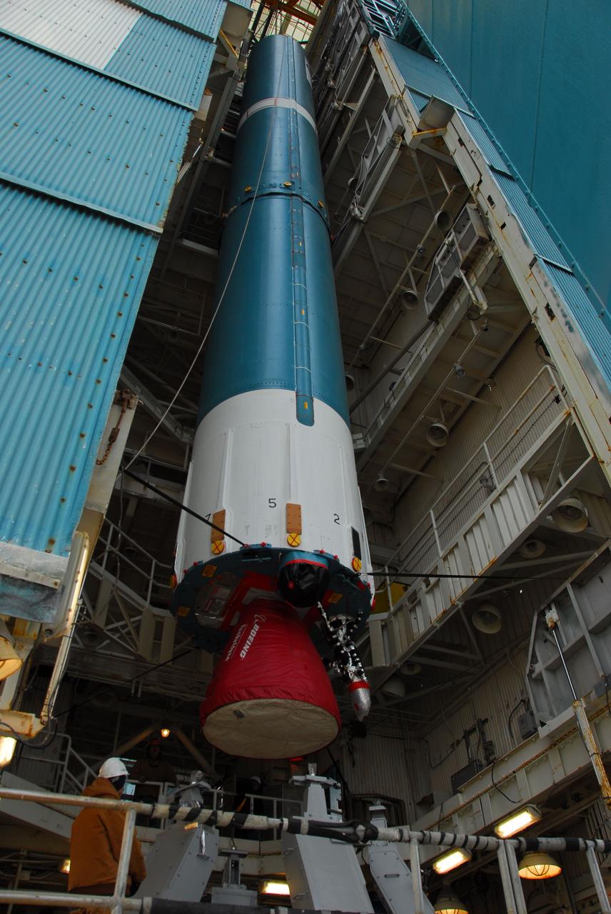 VANDENBERG AIR FORCE BASE, Calif. -- The first stage of the Delta II rocket that will carry NASA's Aquarius satellite into low Earth orbit is raised onto the launch pad at Vandenberg Air Force Base's Space Launch Complex-2 (SLC-2) in California. While the Delta II rocket is stacked on SLC-2, teams for NASA's Glory spacecraft and Orbital Sciences Taurus XL rocket are in launch preparation mode at Vandenberg's nearby Space Launch Complex 576-E.    Scheduled to launch in June, Aquarius' mission will be to provide monthly maps of global changes in sea surface salinity. By measuring ocean salinity from space, Aquarius will provide new insights into how the massive natural exchange of freshwater between the ocean, atmosphere and sea ice influences ocean circulation, weather and climate. Also going up with the satellite are optical and thermal cameras, a microwave radiometer and the SAC-D spacecraft, which were developed with the help of institutions in Italy, France, Canada and Argentina. Photo credit: NASA/VAFB