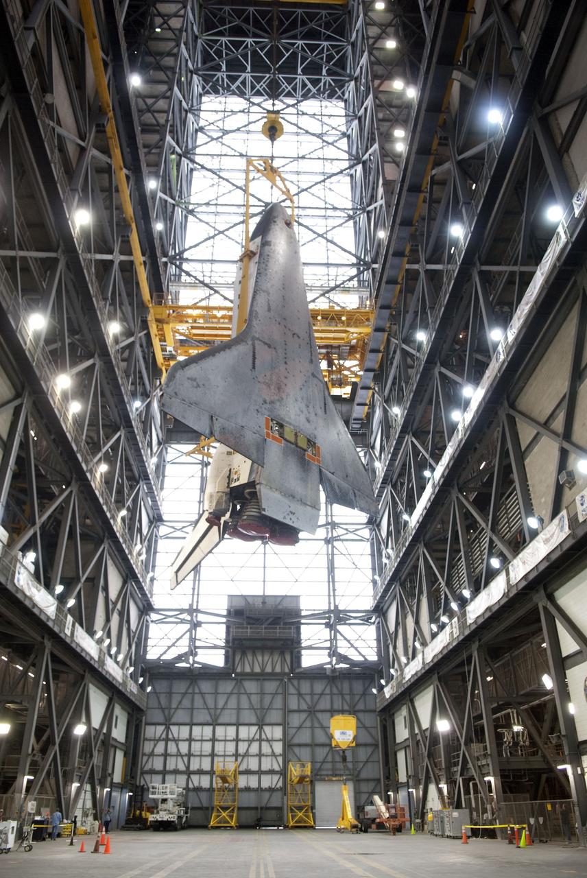 CAPE CANAVERAL, Fla. -- In the Vehicle Assembly Building at NASA's Kennedy Space Center in Florida, shuttle Endeavour is being lifted and moved into a high bay where it will be attached to its external fuel tank and solid rocket boosters, already positioned on the mobile launcher platform. Endeavour and its STS-134 crew will deliver the Express Logistics Carrier-3, Alpha Magnetic Spectrometer, a high-pressure gas tank, additional spare parts for Dextre and micrometeoroid debris shields to the International Space Station. Endeavour's final launch is targeted for April 19 at 7:48 p.m. EDT. For more information visit, http://www.nasa.gov/mission_pages/shuttle/shuttlemissions/sts134/index.html. Photo credit: NASA/Jim Grossmann