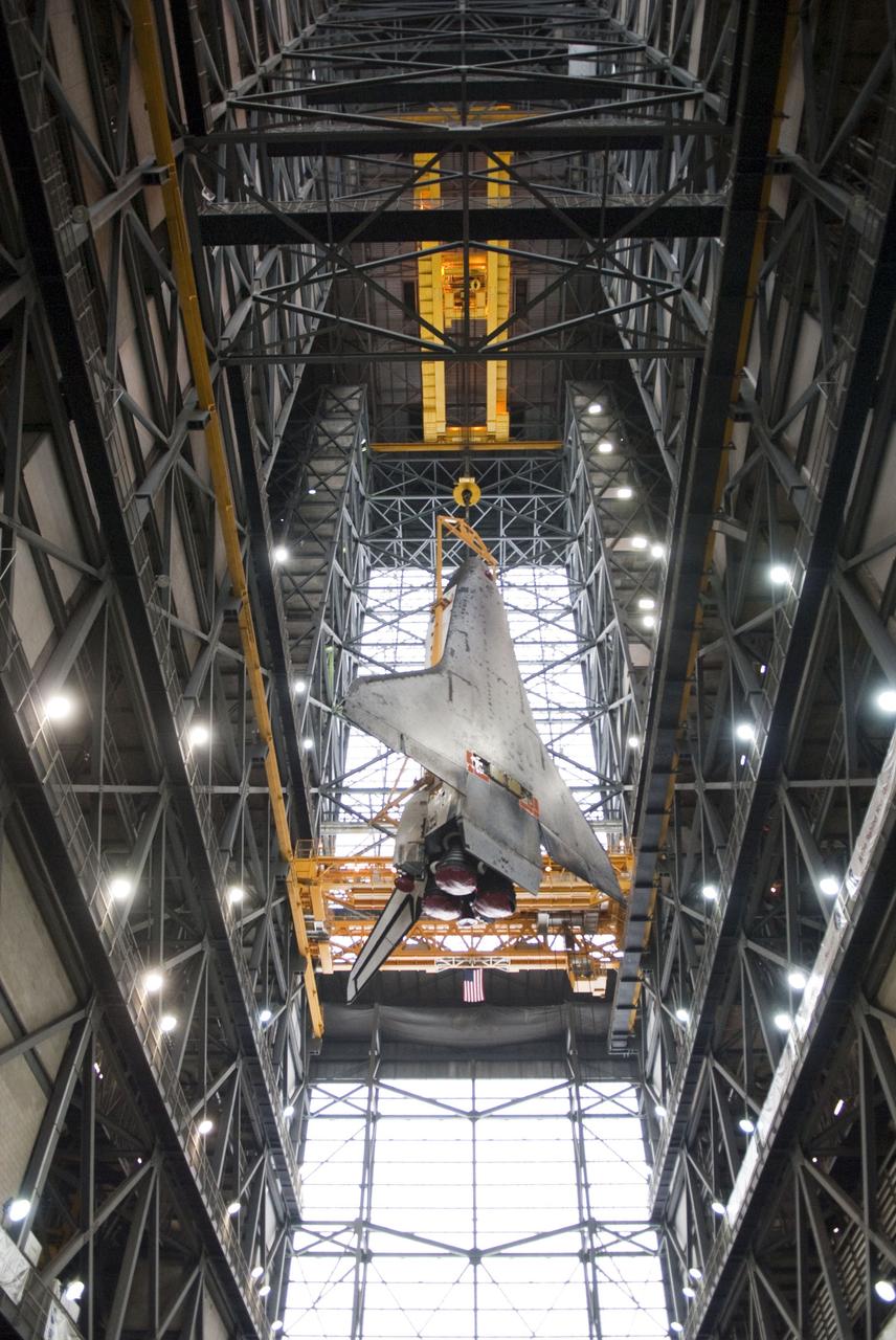 CAPE CANAVERAL, Fla. -- In the Vehicle Assembly Building at NASA's Kennedy Space Center in Florida, shuttle Endeavour is being lifted and moved into a high bay where it will be attached to its external fuel tank and solid rocket boosters, already positioned on the mobile launcher platform. Endeavour and its STS-134 crew will deliver the Express Logistics Carrier-3, Alpha Magnetic Spectrometer, a high-pressure gas tank, additional spare parts for Dextre and micrometeoroid debris shields to the International Space Station. Endeavour's final launch is targeted for April 19 at 7:48 p.m. EDT. For more information visit, http://www.nasa.gov/mission_pages/shuttle/shuttlemissions/sts134/index.html. Photo credit: NASA/Jim Grossmann