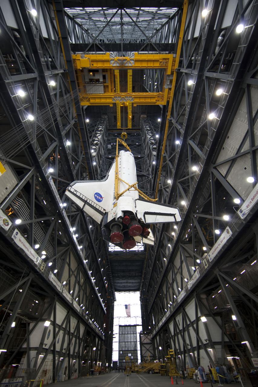 CAPE CANAVERAL, Fla. -- A large yellow, metal sling lifts shuttle Endeavour from the transfer aisle into a high bay of the Vehicle Assembly Building at NASA's Kennedy Space Center in Florida. In the bay, the shuttle will be attached to its external fuel tank and solid rocket boosters. Endeavour is targeted to roll out to Kennedy's Launch Pad 39A for its final mission, STS-134, on March 9. Endeavour and the six-member crew will deliver the Express Logistics Carrier-3, Alpha Magnetic Spectrometer-2 (AMS), a high-pressure gas tank, additional spare parts for the Dextre robotic helper and micrometeoroid debris shields to the International Space Station. Endeavour's final launch is targeted for April 19 at 7:48 p.m. EDT. For more information visit, http://www.nasa.gov/mission_pages/shuttle/shuttlemissions/sts134/index.html. Photo credit: NASA/Frankie Martin