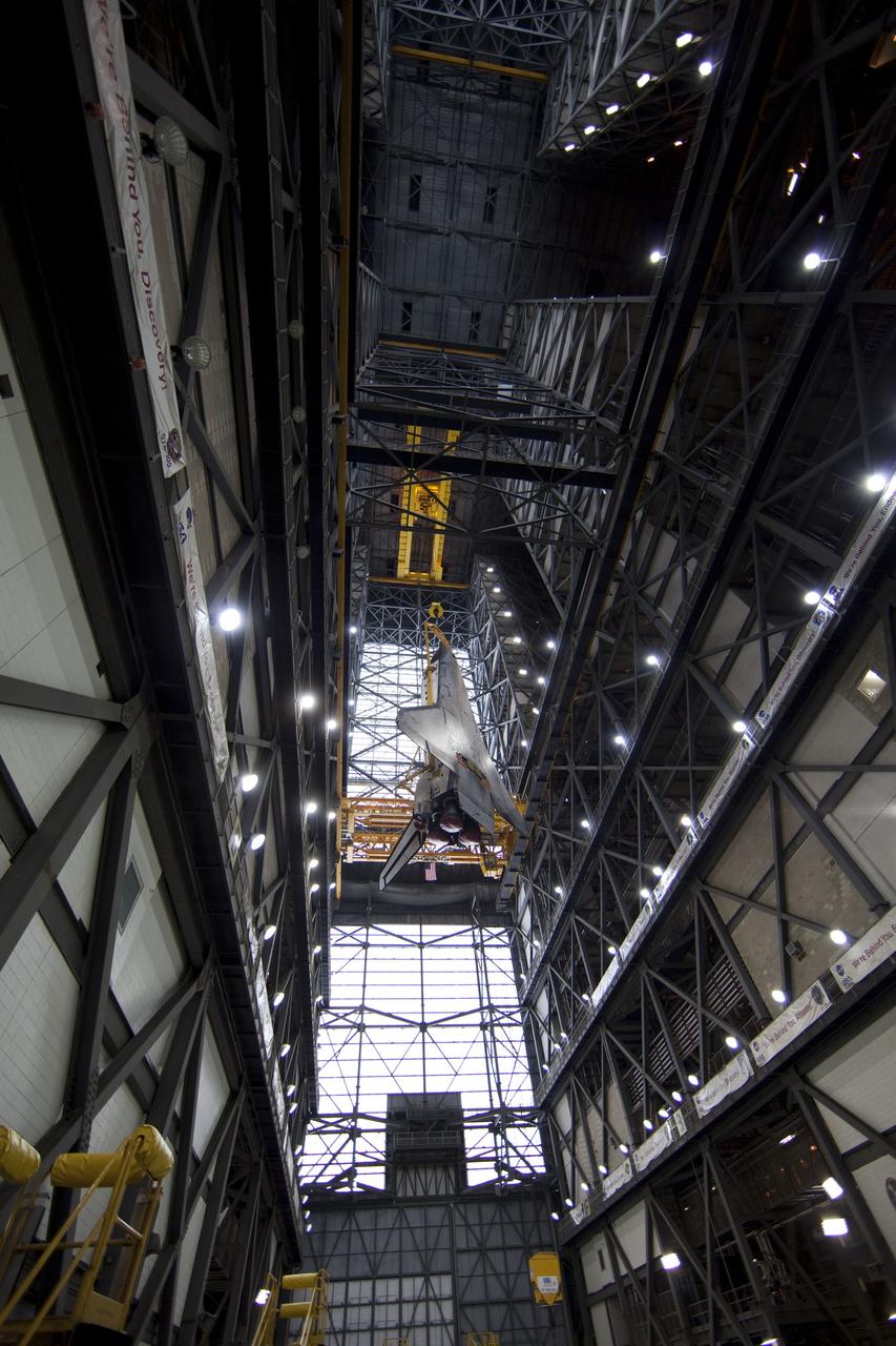 CAPE CANAVERAL, Fla. -- A large yellow, metal sling lifts shuttle Endeavour from the transfer aisle into a high bay of the Vehicle Assembly Building at NASA's Kennedy Space Center in Florida. In the bay, the shuttle will be attached to its external fuel tank and solid rocket boosters. Endeavour is targeted to roll out to Kennedy's Launch Pad 39A for its final mission, STS-134, on March 9. Endeavour and the six-member crew will deliver the Express Logistics Carrier-3, Alpha Magnetic Spectrometer-2 (AMS), a high-pressure gas tank, additional spare parts for the Dextre robotic helper and micrometeoroid debris shields to the International Space Station. Endeavour's final launch is targeted for April 19 at 7:48 p.m. EDT. For more information visit, http://www.nasa.gov/mission_pages/shuttle/shuttlemissions/sts134/index.html. Photo credit: NASA/Frankie Martin