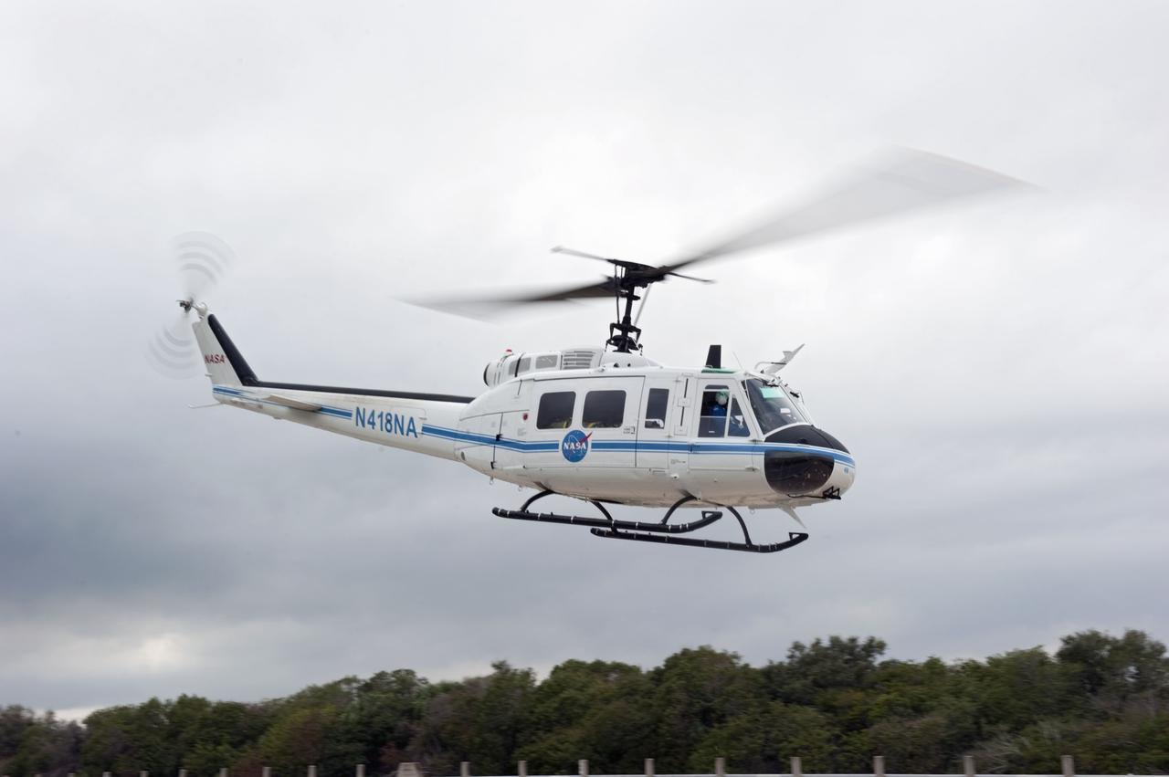 CAPE CANAVERAL, Fla. – A helicopter takes part in an emergency exit, or Mode II/IV, exercise that allows teams to practice an emergency response at Launch Pad 39A at NASA's Kennedy Space Center in Florida. The exercise involves NASA fire rescue personnel, volunteers portraying astronauts with simulated injuries, helicopters and personnel from the Air Force’s 920th Rescue Wing, and medical trauma teams at three Central Florida hospitals. The drill allows teams to practice an emergency response at the launch pad, including helicopter evacuation to local hospitals.     Photo credit: NASA/Kim Shiflett