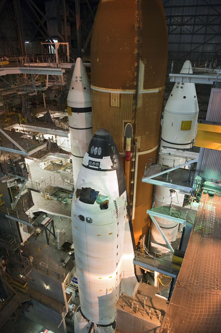 CAPE CANAVERAL, Fla. -- Space shuttle Endeavour is firmly attached to its external fuel tank and solid rocket boosters in a high bay of the Vehicle Assembly Building at NASA's Kennedy Space Center in Florida. Endeavour is targeted to roll out to Kennedy's Launch Pad 39A for its final mission, STS-134, on March 9. Endeavour and the six-member crew will deliver the Express Logistics Carrier-3, Alpha Magnetic Spectrometer-2 (AMS), a high-pressure gas tank, additional spare parts for the Dextre robotic helper and micrometeoroid debris shields to the International Space Station. Endeavour's final launch is targeted for April 19 at 7:48 p.m. EDT. For more information visit, http://www.nasa.gov/mission_pages/shuttle/shuttlemissions/sts134/index.html. Photo credit: NASA/Kim Shiflett