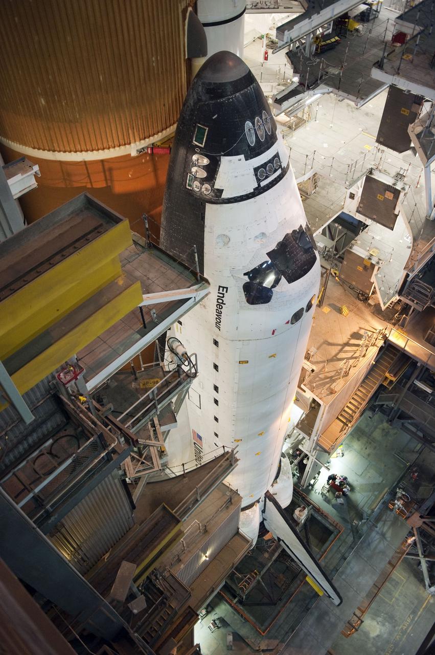 CAPE CANAVERAL, Fla. -- Space shuttle Endeavour is firmly attached to its external fuel tank and solid rocket boosters in a high bay of the Vehicle Assembly Building at NASA's Kennedy Space Center in Florida. Endeavour is targeted to roll out to Kennedy's Launch Pad 39A for its final mission, STS-134, on March 9. Endeavour and the six-member crew will deliver the Express Logistics Carrier-3, Alpha Magnetic Spectrometer-2 (AMS), a high-pressure gas tank, additional spare parts for the Dextre robotic helper and micrometeoroid debris shields to the International Space Station. Endeavour's final launch is targeted for April 19 at 7:48 p.m. EDT. For more information visit, http://www.nasa.gov/mission_pages/shuttle/shuttlemissions/sts134/index.html. Photo credit: NASA/Kim Shiflett