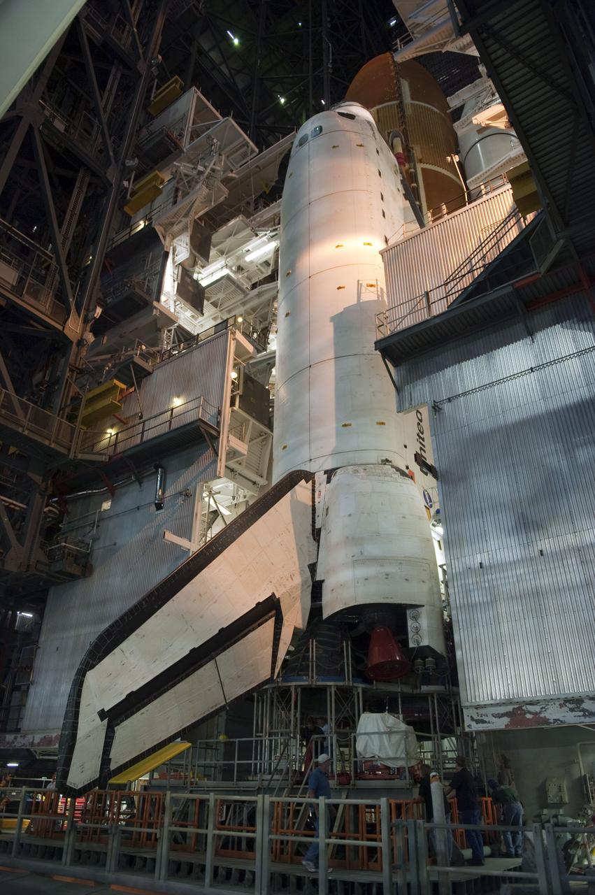 CAPE CANAVERAL, Fla. -- Space shuttle Endeavour is firmly attached to its external fuel tank and solid rocket boosters in a high bay of the Vehicle Assembly Building at NASA's Kennedy Space Center in Florida. Endeavour is targeted to roll out to Kennedy's Launch Pad 39A for its final mission, STS-134, on March 9. Endeavour and the six-member crew will deliver the Express Logistics Carrier-3, Alpha Magnetic Spectrometer-2 (AMS), a high-pressure gas tank, additional spare parts for the Dextre robotic helper and micrometeoroid debris shields to the International Space Station. Endeavour's final launch is targeted for April 19 at 7:48 p.m. EDT. For more information visit, http://www.nasa.gov/mission_pages/shuttle/shuttlemissions/sts134/index.html. Photo credit: NASA/Kim Shiflett
