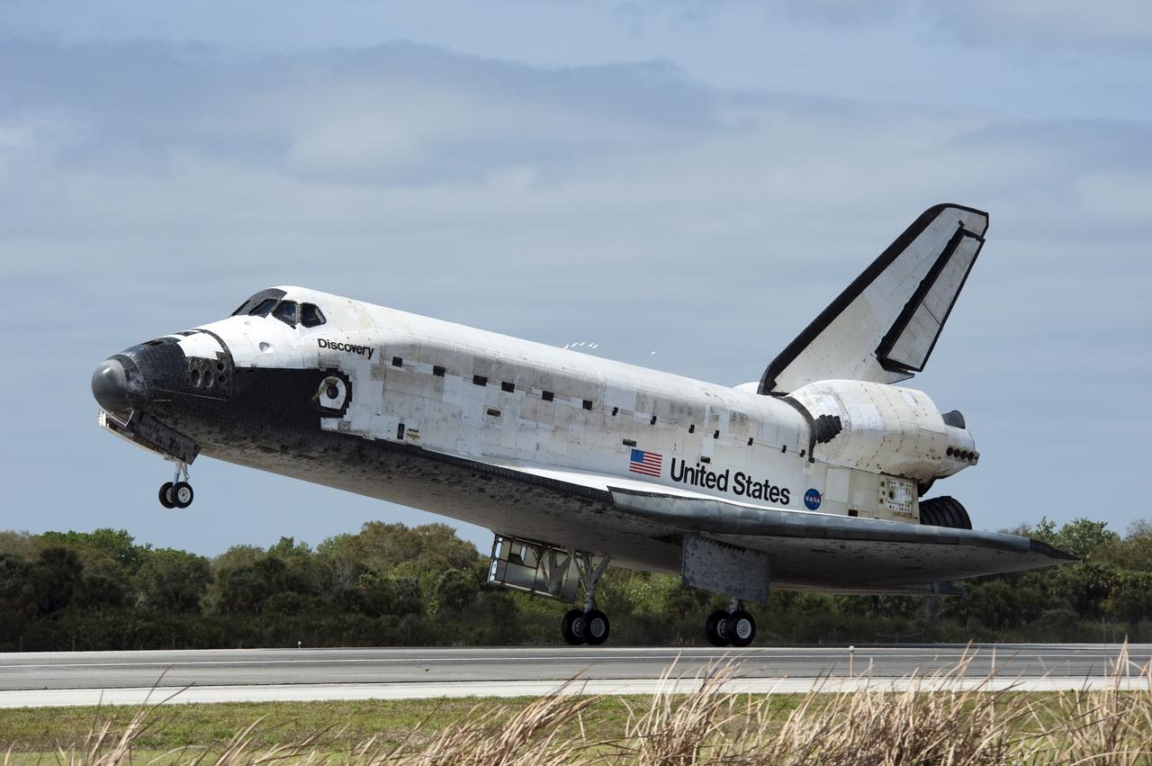 CAPE CANAVERAL, Fla. -- Space shuttle Discovery touches down on Runway 15 at the Shuttle Landing Facility at NASA's Kennedy Space Center in Florida. Landing was at 11:57 a.m. EST, completing the 13-day STS-133 mission to the International Space Station.         Main gear touchdown was at 11:57:17 a.m., followed by nose gear touchdown at 11:57:28, and wheelstop at 11:58:14 a.m. On board are Commander Steve Lindsey, Pilot Eric Boe, and Mission Specialists Nicole Stott, Michael Barratt, Alvin Drew and Steve Bowen. Discovery and its six-member crew delivered the Permanent Multipurpose Module, packed with supplies and critical spare parts, as well as Robonaut 2, the dexterous humanoid astronaut helper, to the orbiting outpost. STS-133 was Discovery's 39th and final mission. This was the 133rd Space Shuttle Program mission and the 35th shuttle voyage to the space station. Photo credit: NASA/Tom Farrar