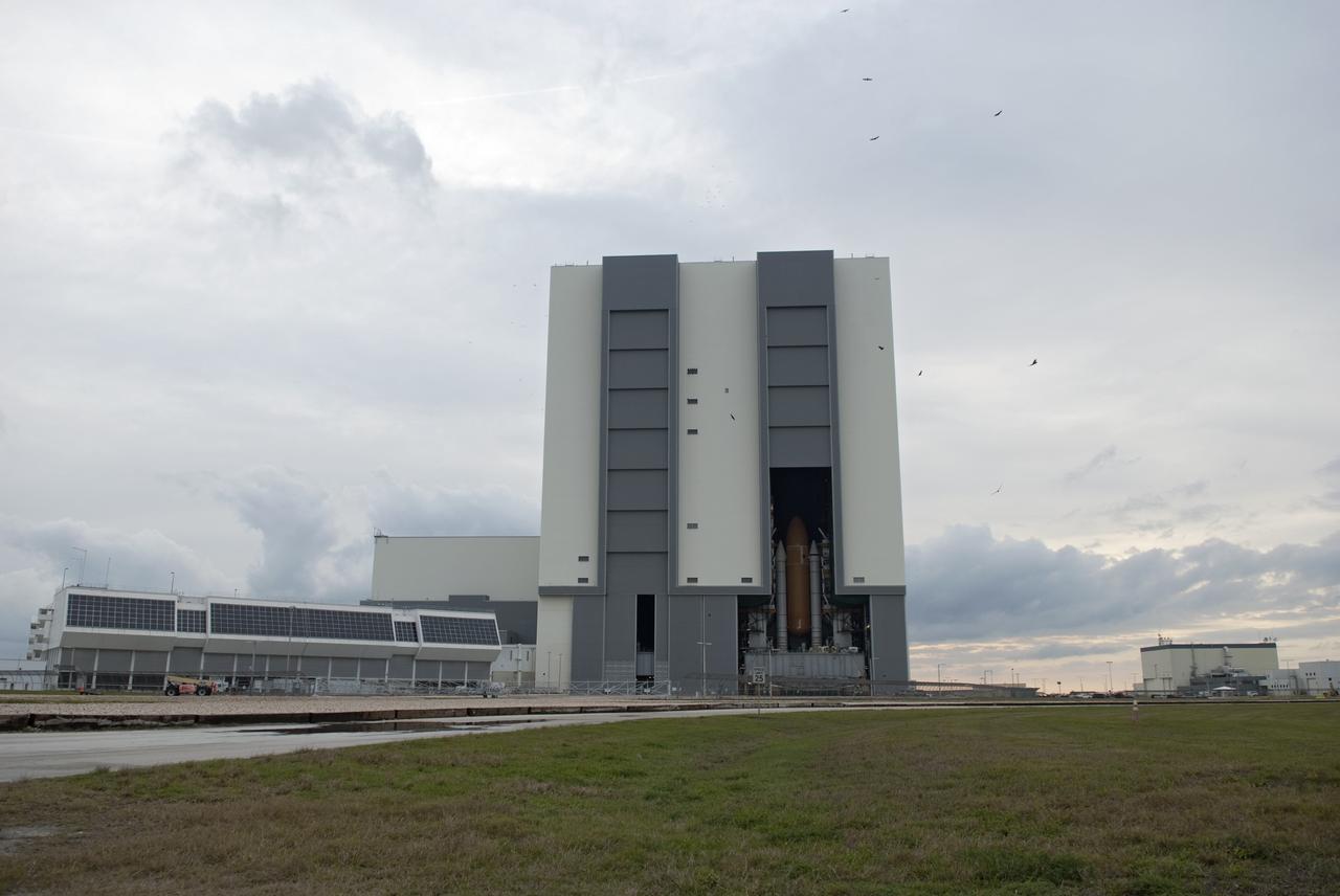 CAPE CANAVERAL, Fla. -- Space shuttle Endeavour, attached to its external fuel tank and solid rocket boosters atop a crawler-transporter, is ready for its slow move from High Bay 3 in the Vehicle Assembly Building to Launch Pad 39A at NASA's Kennedy Space Center in Florida. The 3.4-mile trek, known as "rollout," will take about seven hours to complete. This is the final scheduled rollout for Endeavour. Endeavour and its six STS-134 crew members will deliver the Express Logistics Carrier-3, Alpha Magnetic Spectrometer-2 (AMS), a high-pressure gas tank, additional spare parts for the Dextre robotic helper and micrometeoroid debris shields to the International Space Station on the shuttle's final spaceflight. Launch is targeted for April 19 at 7:48 p.m. EDT. For more information visit, www.nasa.gov/mission_pages/shuttle/shuttlemissions/sts134/index.html. Photo credit: NASA/Jim Grossmann