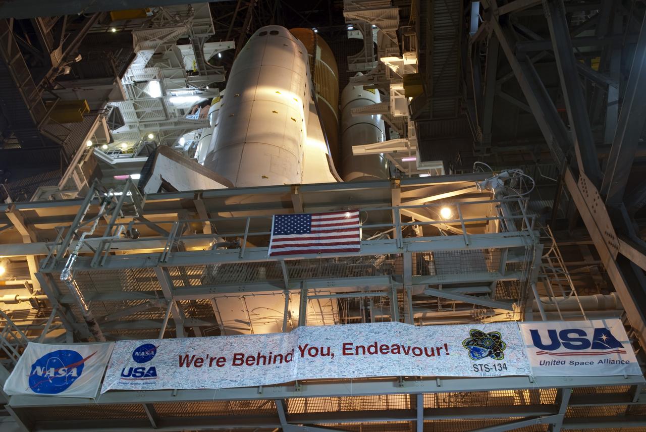 CAPE CANAVERAL, Fla. -- Space shuttle Endeavour begins its slow move from High Bay 3 in the Vehicle Assembly Building to Launch Pad 39A at NASA's Kennedy Space Center in Florida at 7:56 p.m. EST. The 3.4-mile trek, known as "rollout," will take about seven hours to complete. This is the final scheduled rollout for Endeavour, which is attached to its external fuel tank and solid rocket boosters atop a crawler-transporter. Endeavour and its six STS-134 crew members will deliver the Express Logistics Carrier-3, Alpha Magnetic Spectrometer-2 (AMS), a high-pressure gas tank, additional spare parts for the Dextre robotic helper and micrometeoroid debris shields to the International Space Station on the shuttle's final spaceflight. Launch is targeted for April 19 at 7:48 p.m. EDT. For more information visit, www.nasa.gov/mission_pages/shuttle/shuttlemissions/sts134/index.html. Photo credit: NASA/Jim Grossmann