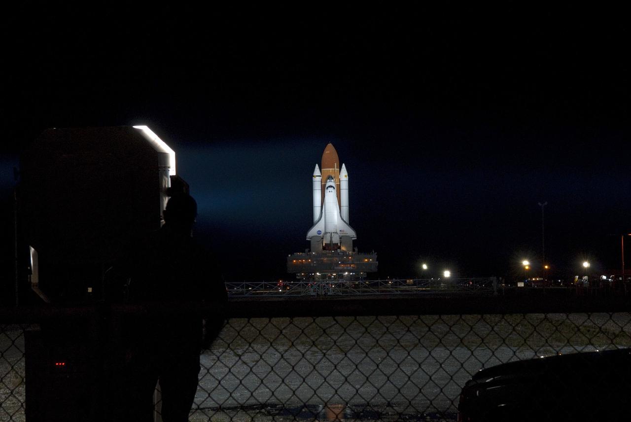 CAPE CANAVERAL, Fla. -- Bathed in xenon lights, space shuttle Endeavour, attached to its external fuel tank and solid rocket boosters, is on a nighttime journey from the Vehicle Assembly Building to Launch Pad 39A at NASA's Kennedy Space Center in Florida. The 3.4-mile trek, known as "rollout," began at 7:56 p.m. EST and will take about seven hours to complete. This is the final scheduled rollout for Endeavour, which is attached to its external fuel tank and solid rocket boosters atop a crawler-transporter. Endeavour and its six STS-134 crew members will deliver the Express Logistics Carrier-3, Alpha Magnetic Spectrometer-2 (AMS), a high-pressure gas tank, additional spare parts for the Dextre robotic helper and micrometeoroid debris shields to the International Space Station on the shuttle's final spaceflight. Launch is targeted for April 19 at 7:48 p.m. EDT. For more information visit, www.nasa.gov/mission_pages/shuttle/shuttlemissions/sts134/index.html. Photo credit: NASA/Jim Grossmann