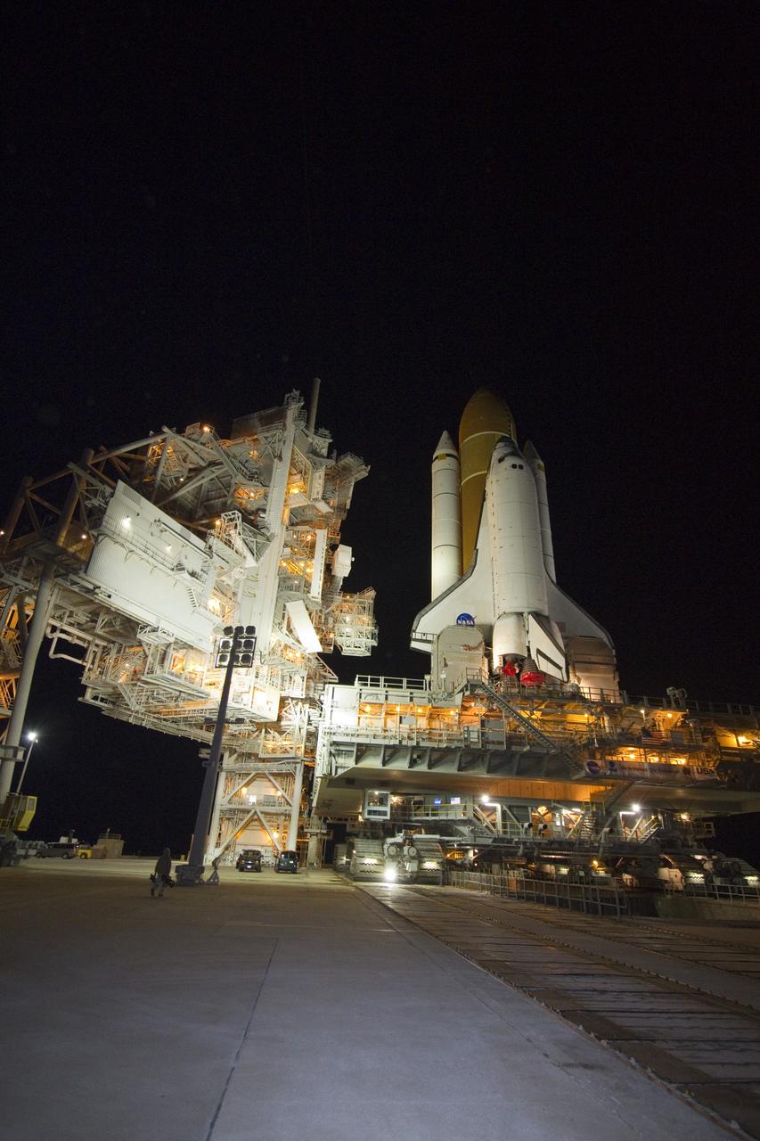 CAPE CANAVERAL, Fla. -- Space shuttle Endeavour is positioned over the flame trench at Launch Pad 39A at NASA's Kennedy Space Center in Florida.    Riding atop a crawler-transporter attached to its external fuel tank and solid rocket boosters, Endeavour's 3.4-mile trek, known as "rollout," began at the Vehicle Assembly Building at 7:56 p.m. EST March 10 and ended at 3:49 a.m. EST, nearly eight hours later. This is Endeavour's final scheduled rollout.  Endeavour and its six-member crew will deliver the Express Logistics Carrier-3, Alpha Magnetic Spectrometer-2 (AMS), a high-pressure gas tank, additional spare parts for the Dextre robotic helper and micrometeoroid debris shields to the International Space Station on the shuttle's final spaceflight, STS-134. Launch is targeted for 7:48 p.m. EDT April 19. For more information, visit www.nasa.gov/mission_pages/shuttle/shuttlemissions/sts134/index.html. Photo credit: NASA/Jack Pfaller