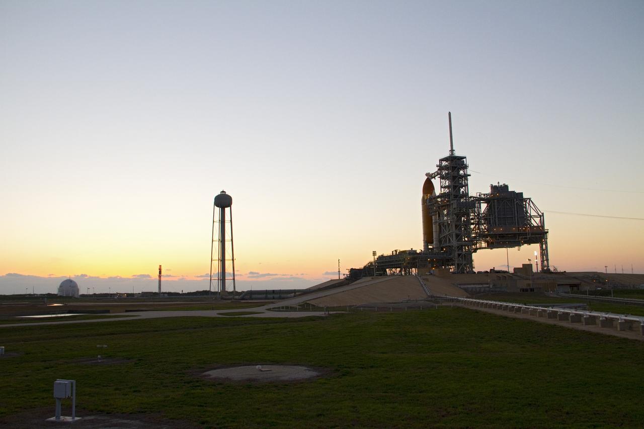 CAPE CANAVERAL, Fla. -- Processing of space shuttle Endeavour at Launch Pad 39A at NASA's Kennedy Space Center in Florida is under way as morning breaks.    Riding atop a crawler-transporter attached to its external fuel tank and solid rocket boosters, Endeavour's 3.4-mile trek, known as "rollout," began at the Vehicle Assembly Building at 7:56 p.m. EST March 10 and ended at 3:49 a.m. EST, nearly eight hours later. This is Endeavour's final scheduled rollout.  Endeavour and its six-member crew will deliver the Express Logistics Carrier-3, Alpha Magnetic Spectrometer-2 (AMS), a high-pressure gas tank, additional spare parts for the Dextre robotic helper and micrometeoroid debris shields to the International Space Station on the shuttle's final spaceflight, STS-134. Launch is targeted for 7:48 p.m. EDT April 19. For more information, visit www.nasa.gov/mission_pages/shuttle/shuttlemissions/sts134/index.html. Photo credit: NASA/Jack Pfaller