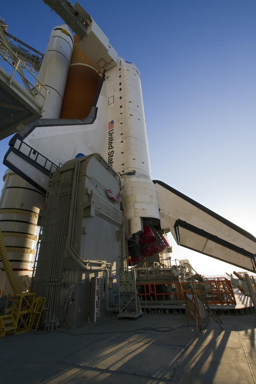 CAPE CANAVERAL, Fla. -- The orbiter access arm swings into position against space shuttle Endeavour following its arrival at Launch Pad 39A at NASA's Kennedy Space Center in Florida.    Riding atop a crawler-transporter attached to its external fuel tank and solid rocket boosters, Endeavour's 3.4-mile trek, known as "rollout," began at the Vehicle Assembly Building at 7:56 p.m. EST March 10 and ended at 3:49 a.m. EST, nearly eight hours later. This is Endeavour's final scheduled rollout.  Endeavour and its six-member crew will deliver the Express Logistics Carrier-3, Alpha Magnetic Spectrometer-2 (AMS), a high-pressure gas tank, additional spare parts for the Dextre robotic helper and micrometeoroid debris shields to the International Space Station on the shuttle's final spaceflight, STS-134. Launch is targeted for 7:48 p.m. EDT April 19. For more information, visit www.nasa.gov/mission_pages/shuttle/shuttlemissions/sts134/index.html. Photo credit: NASA/Jack Pfaller