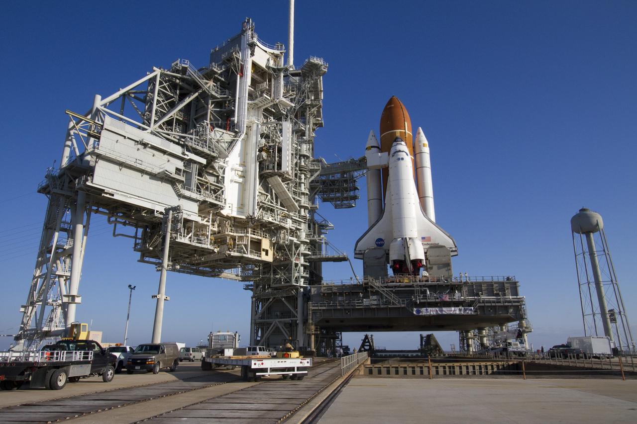 CAPE CANAVERAL, Fla. -- Space shuttle Endeavour's mobile launcher platform sits over the flame trench at Launch Pad 39A at NASA's Kennedy Space Center in Florida.    Riding atop a crawler-transporter attached to its external fuel tank and solid rocket boosters, Endeavour's 3.4-mile trek, known as "rollout," began at the Vehicle Assembly Building at 7:56 p.m. EST March 10 and ended at 3:49 a.m. EST, nearly eight hours later. This is Endeavour's final scheduled rollout.  Endeavour and its six-member crew will deliver the Express Logistics Carrier-3, Alpha Magnetic Spectrometer-2 (AMS), a high-pressure gas tank, additional spare parts for the Dextre robotic helper and micrometeoroid debris shields to the International Space Station on the shuttle's final spaceflight, STS-134. Launch is targeted for 7:48 p.m. EDT April 19. For more information, visit www.nasa.gov/mission_pages/shuttle/shuttlemissions/sts134/index.html. Photo credit: NASA/Jack Pfaller
