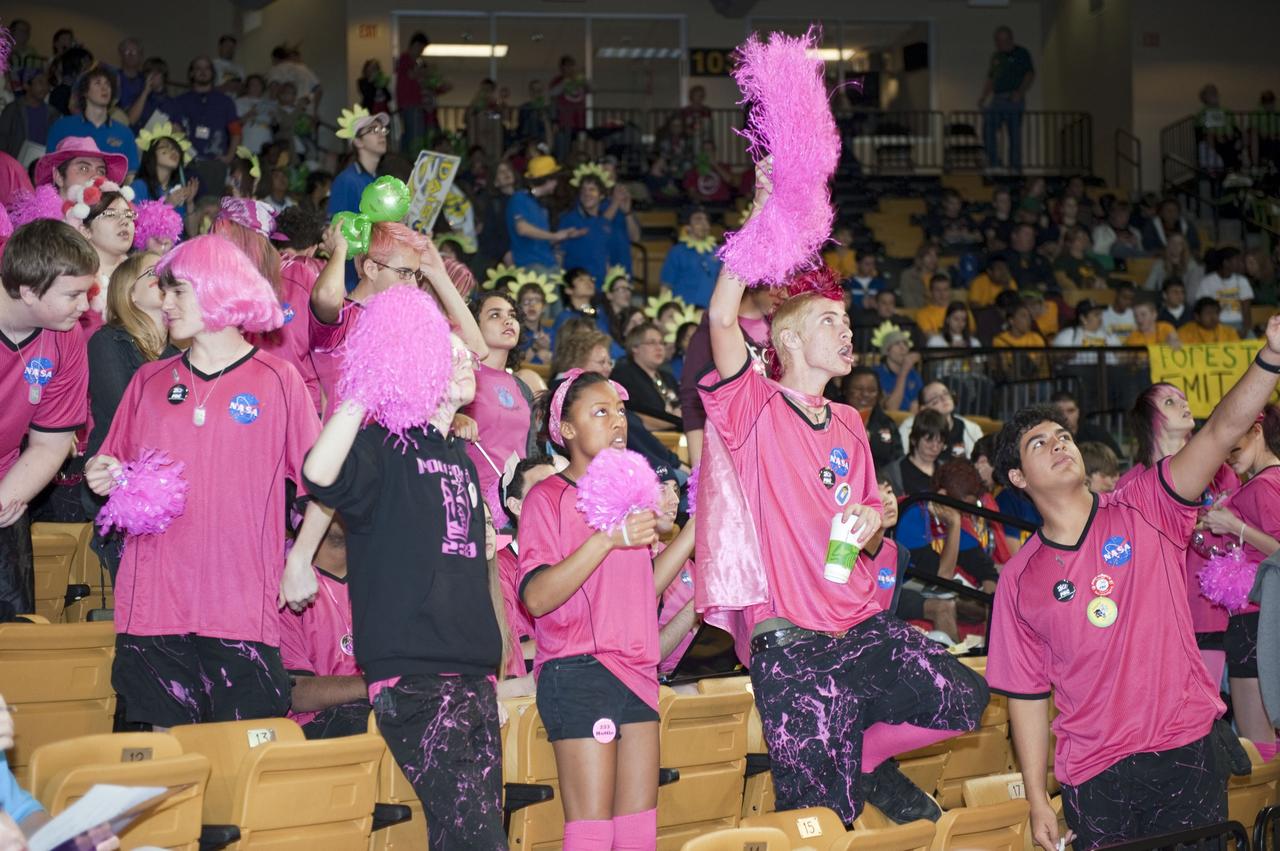 ORLANDO, Fla. – The Pink Team participates in the regional FIRST robotics competition at the University of Central Florida in Orlando. The team is made up of students from Rockledge, Cocoa Beach and Viera high schools along the Space Coast of Florida. NASA’s Kennedy Space Center is a sponsor of the team. The Pink Team finished sixth in the competition called "For Inspiration and Recognition of Science and Technology," or FIRST, among about 60 high school teams hoping to advance to the national robotics championship. The team also took home the Industrial Design Award sponsored by General Motors. FIRST, founded in 1989, is a non-profit organization that designs accessible, innovative programs to build self-confidence, knowledge and life skills while motivating young people to pursue academic opportunities. The robotics competition challenges teams of high school students and their mentors to solve a common problem in a six-week timeframe using a standard kit of parts and a common set of rules. Photo credit: NASA/Glenn Benson