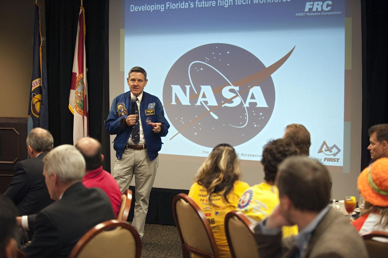 ORLANDO, Fla. – NASA Kennedy Space Center Director Bob Cabana talks to high school students taking part in the "For Inspiration and Recognition of Science and Technology," or FIRST, competition at the University of Central Florida in Orlando. FIRST, founded in 1989, is a non-profit organization that designs accessible, innovative programs to build self-confidence, knowledge and life skills while motivating young people to pursue academic opportunities. The robotics competition challenges teams of high school students and their mentors to solve a common problem in a six-week timeframe using a standard kit of parts and a common set of rules. Photo credit: NASA/Glenn Benson