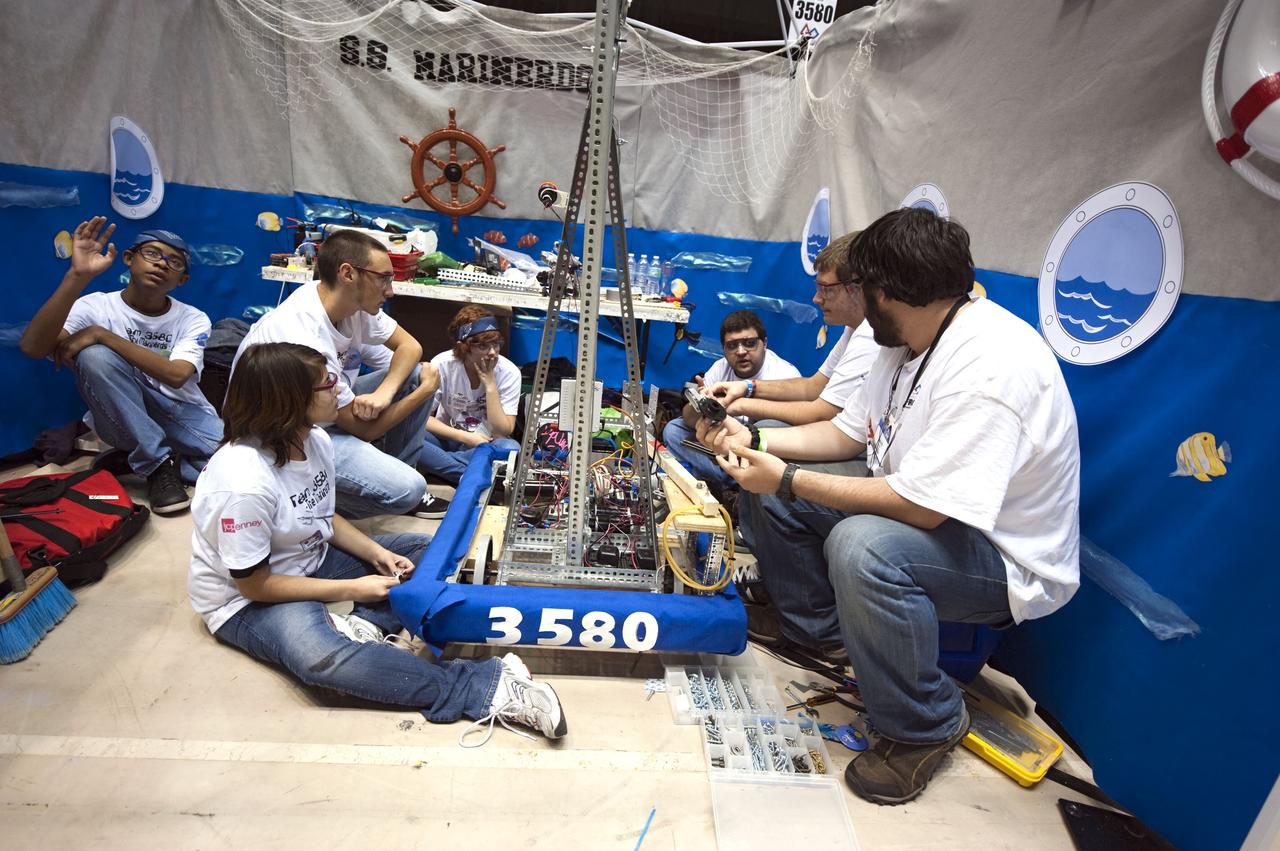 ORLANDO, Fla. – The S.S. Marinerds team participates in the regional FIRST robotics competition at the University of Central Florida in Orlando. The team is made up of students from Mariner High School in Cape Coral, Fla. NASA is a sponsor of the team. About 60 high school teams took part in the competition called "For Inspiration and Recognition of Science and Technology," or FIRST, in hopes of advancing to the national robotics championship. FIRST, founded in 1989, is a non-profit organization that designs accessible, innovative programs to build self-confidence, knowledge and life skills while motivating young people to pursue academic opportunities. The robotics competition challenges teams of high school students and their mentors to solve a common problem in a six-week timeframe using a standard kit of parts and a common set of rules. Photo credit: NASA/Glenn Benson