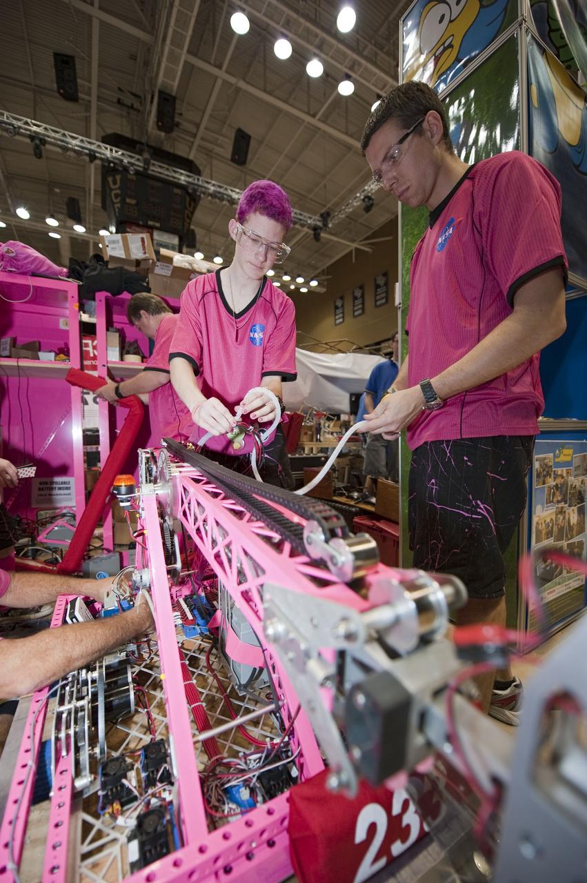 ORLANDO, Fla. – The Pink Team participates in the regional FIRST robotics competition at the University of Central Florida in Orlando. The team is made up of students from Rockledge, Cocoa Beach and Viera high schools along the Space Coast of Florida. NASA’s Kennedy Space Center is a sponsor of the team. The Pink Team finished sixth in the competition called "For Inspiration and Recognition of Science and Technology," or FIRST, among about 60 high school teams hoping to advance to the national robotics championship. The team also took home the Industrial Design Award sponsored by General Motors. FIRST, founded in 1989, is a non-profit organization that designs accessible, innovative programs to build self-confidence, knowledge and life skills while motivating young people to pursue academic opportunities. The robotics competition challenges teams of high school students and their mentors to solve a common problem in a six-week timeframe using a standard kit of parts and a common set of rules. Photo credit: NASA/Glenn Benson
