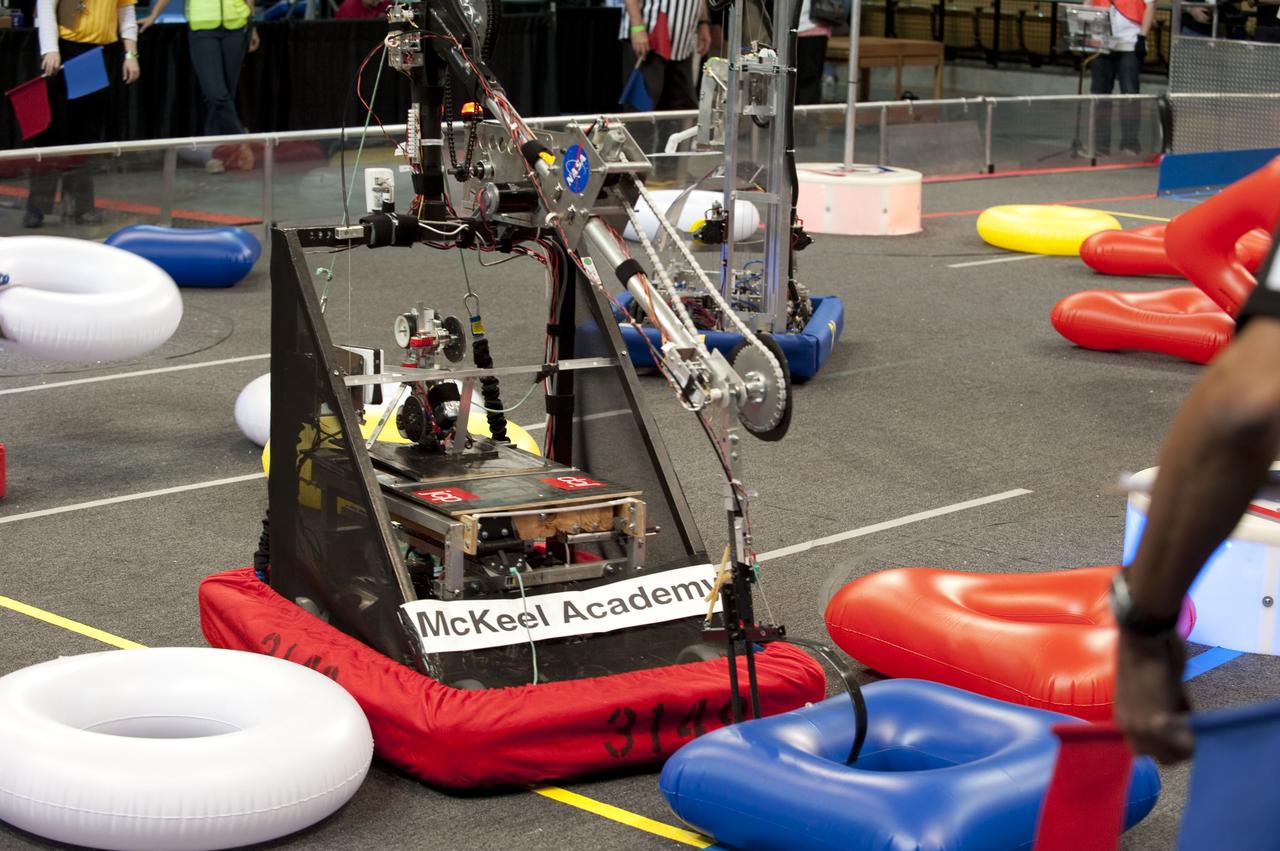 ORLANDO, Fla. – The Team 3149 robot participates in the regional FIRST robotics competition at the University of Central Florida in Orlando. The team is made up of students from McKeel Academy of Technology in Lakeland, Fla. NASA is a sponsor of the team. Team 3149 finished eighth in the competition called "For Inspiration and Recognition of Science and Technology," or FIRST, among about 60 high school teams hoping to advance to the national robotics championship. FIRST, founded in 1989, is a non-profit organization that designs accessible, innovative programs to build self-confidence, knowledge and life skills while motivating young people to pursue academic opportunities. The robotics competition challenges teams of high school students and their mentors to solve a common problem in a six-week timeframe using a standard kit of parts and a common set of rules. Photo credit: NASA/Glenn Benson