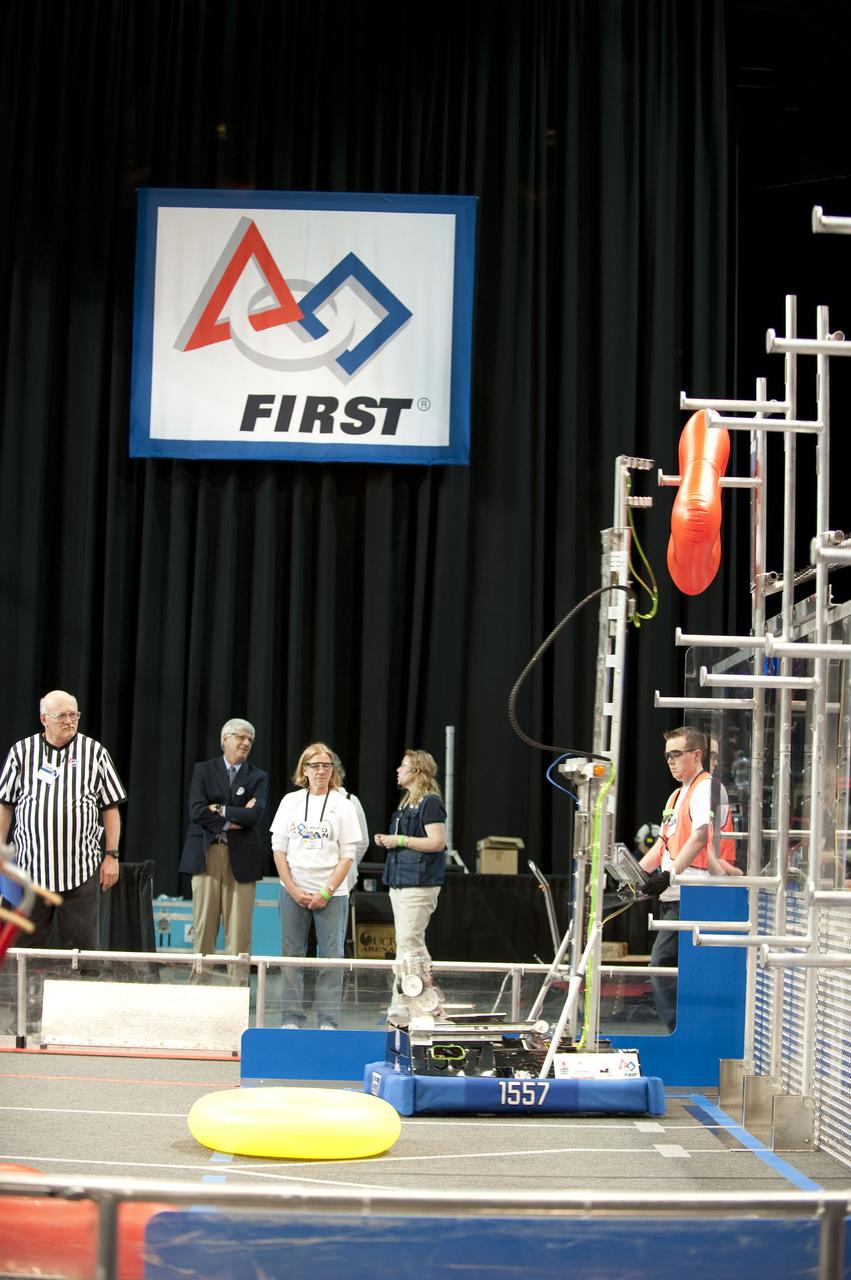 ORLANDO, Fla. – Teams prepare for the "For Inspiration and Recognition of Science and Technology," or FIRST, competition at the University of Central Florida in Orlando. About 60 high school teams took part in hopes of advancing to the national robotics championship. FIRST, founded in 1989, is a non-profit organization that designs accessible, innovative programs to build self-confidence, knowledge and life skills while motivating young people to pursue academic opportunities. The robotics competition challenges teams of high school students and their mentors to solve a common problem in a six-week timeframe using a standard kit of parts and a common set of rules. Photo credit: NASA/Glenn Benson