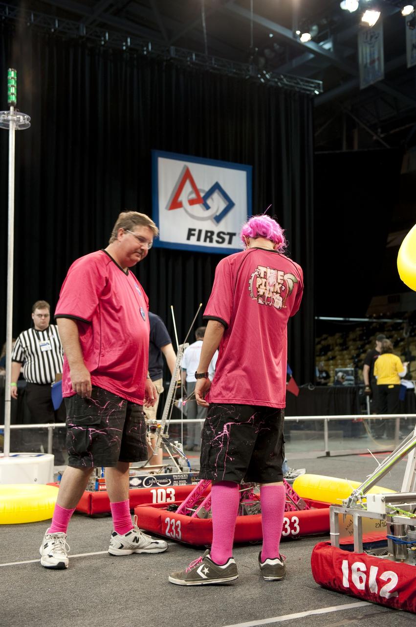 ORLANDO, Fla. – The Pink Team participates in the regional FIRST robotics competition at the University of Central Florida in Orlando. The team is made up of students from Rockledge, Cocoa Beach and Viera high schools along the Space Coast of Florida. NASA’s Kennedy Space Center is a sponsor of the team. The Pink Team finished sixth in the competition called "For Inspiration and Recognition of Science and Technology," or FIRST, among about 60 high school teams hoping to advance to the national robotics championship. The team also took home the Industrial Design Award sponsored by General Motors. FIRST, founded in 1989, is a non-profit organization that designs accessible, innovative programs to build self-confidence, knowledge and life skills while motivating young people to pursue academic opportunities. The robotics competition challenges teams of high school students and their mentors to solve a common problem in a six-week timeframe using a standard kit of parts and a common set of rules. Photo credit: NASA/Glenn Benson