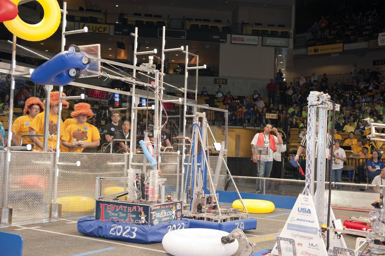 ORLANDO, Fla. – Teams prepare for the "For Inspiration and Recognition of Science and Technology," or FIRST, competition at the University of Central Florida in Orlando. About 60 high school teams took part in hopes of advancing to the national robotics championship. FIRST, founded in 1989, is a non-profit organization that designs accessible, innovative programs to build self-confidence, knowledge and life skills while motivating young people to pursue academic opportunities. The robotics competition challenges teams of high school students and their mentors to solve a common problem in a six-week timeframe using a standard kit of parts and a common set of rules. Photo credit: NASA/Glenn Benson