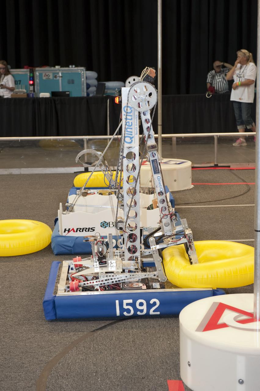 ORLANDO, Fla. –The Bionic Tigers robot participates in the regional FIRST robotics competition at the University of Central Florida in Orlando. The team is made up of students from Cocoa High School and Holy Trinity Episcopal Academy along the Space Coast in Florida. NASA's Launch Services Program based at Kennedy is a sponsor of the team. The Bionic Tigers finished seventh in the competition called "For Inspiration and Recognition of Science and Technology," or FIRST, among about 60 high school teams hoping to advance to the national robotics championship.                  FIRST, founded in 1989, is a non-profit organization that designs accessible, innovative programs to build self-confidence, knowledge and life skills while motivating young people to pursue academic opportunities. The robotics competition challenges teams of high school students and their mentors to solve a common problem in a six-week timeframe using a standard kit of parts and a common set of rules. Photo credit: NASA/Glenn Benson