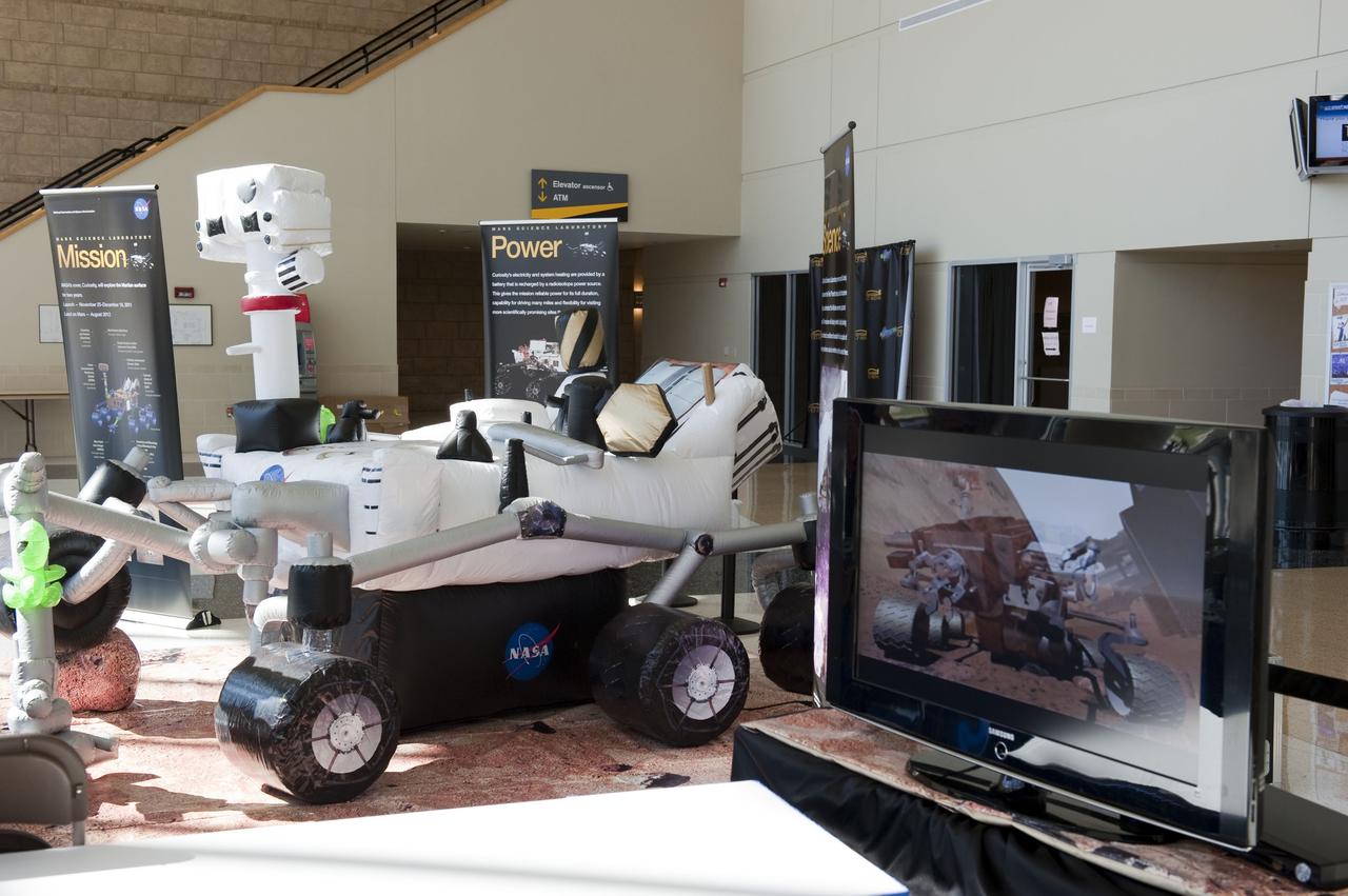 ORLANDO, Fla. – NASA's Jet Propulsion Laboratory (JPL) in Pasadena, Calif., unveiled an inflatable, full-size model of the Mars Science Laboratory mission's Curiosity rover at the "For Inspiration and Recognition of Science and Technology," or FIRST, competition at the University of Central Florida in Orlando. The rover is scheduled to launch from Cape Canaveral Air Force Station in Florida aboard an Atlas V later this year.       FIRST, founded in 1989, is a non-profit organization that designs accessible, innovative programs to build self-confidence, knowledge and life skills while motivating young people to pursue academic opportunities. The robotics competition challenges teams of high school students and their mentors to solve a common problem in a six-week timeframe using a standard kit of parts and a common set of rules. Photo credit: NASA/Glenn Benson