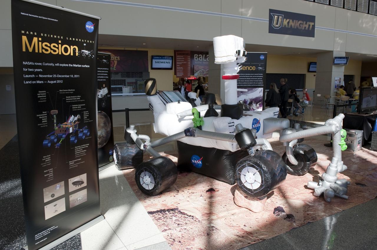 ORLANDO, Fla. – NASA's Jet Propulsion Laboratory (JPL) in Pasadena, Calif., unveiled an inflatable, full-size model of the Mars Science Laboratory mission's Curiosity rover at the "For Inspiration and Recognition of Science and Technology," or FIRST, competition at the University of Central Florida in Orlando. The rover is scheduled to launch from Cape Canaveral Air Force Station in Florida aboard an Atlas V later this year.             FIRST, founded in 1989, is a non-profit organization that designs accessible, innovative programs to build self-confidence, knowledge and life skills while motivating young people to pursue academic opportunities. The robotics competition challenges teams of high school students and their mentors to solve a common problem in a six-week timeframe using a standard kit of parts and a common set of rules. Photo credit: NASA/Glenn Benson