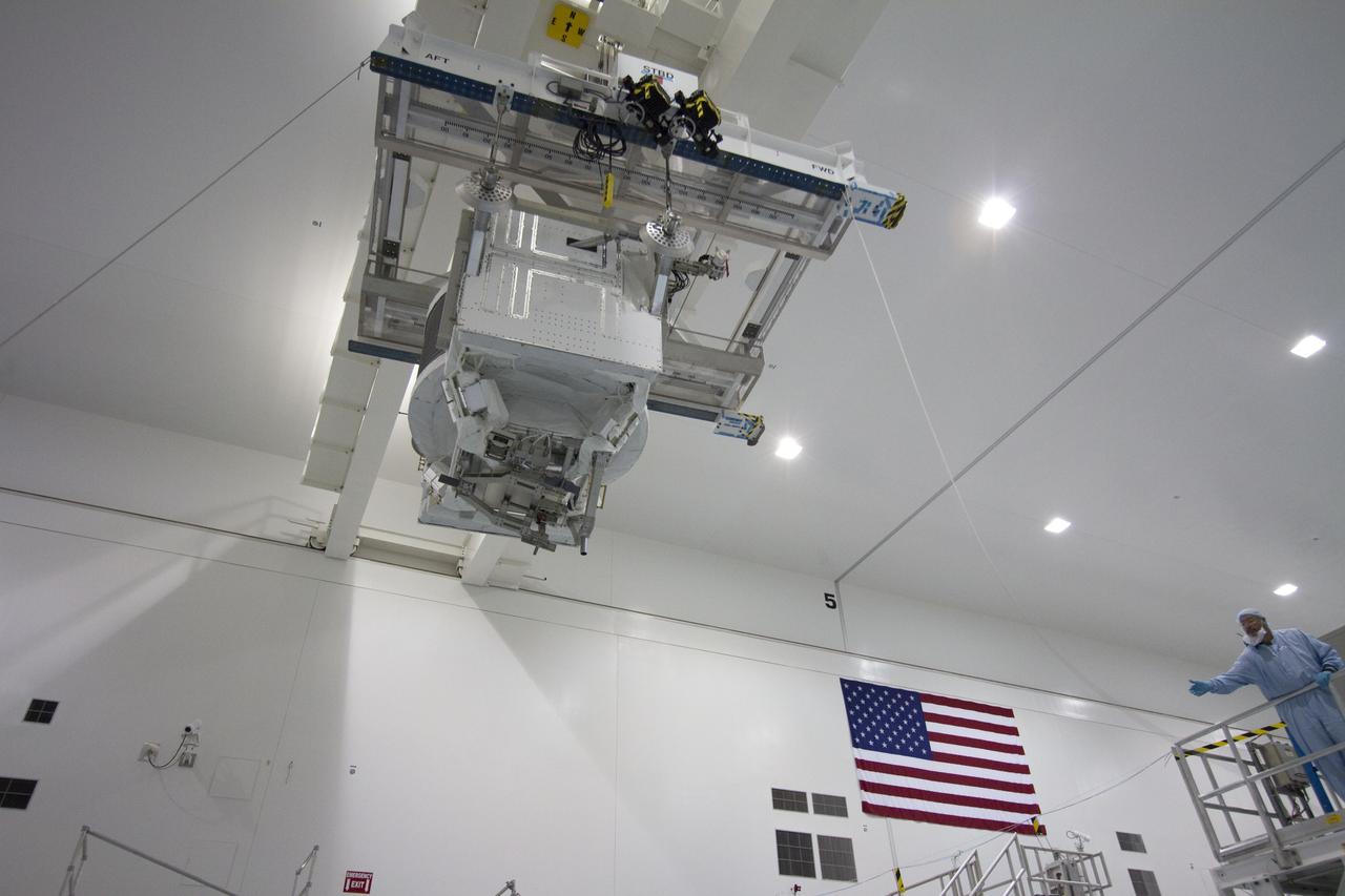 CAPE CANAVERAL, Fla. -- In the Space Station Processing Facility at NASA's Kennedy Space Center in Florida, the Alpha Magnetic Spectrometer-2 (AMS) moves from its primary work stand to the weight and center of gravity stand where final measurements will be taken before launch. Next, AMS will be moved into a payload canister. The canister will protect the space-bound payload on its journey to Launch Pad 39A, where it will later be installed into space shuttle Endeavour’s payload bay.    AMS is a particle physics detector, designed to operate as an external experiment on the International Space Station. It will use the unique environment of space to study the universe and its origin by searching for dark matter. AMS-2 will fly to the station aboard Endeavour's STS-134 mission targeted to launch April 19 at 7:48 p.m. EDT. For more information visit, www.nasa.gov/mission_pages/shuttle/shuttlemissions/sts134/index.html. Photo credit: NASA/Jack Pfaller