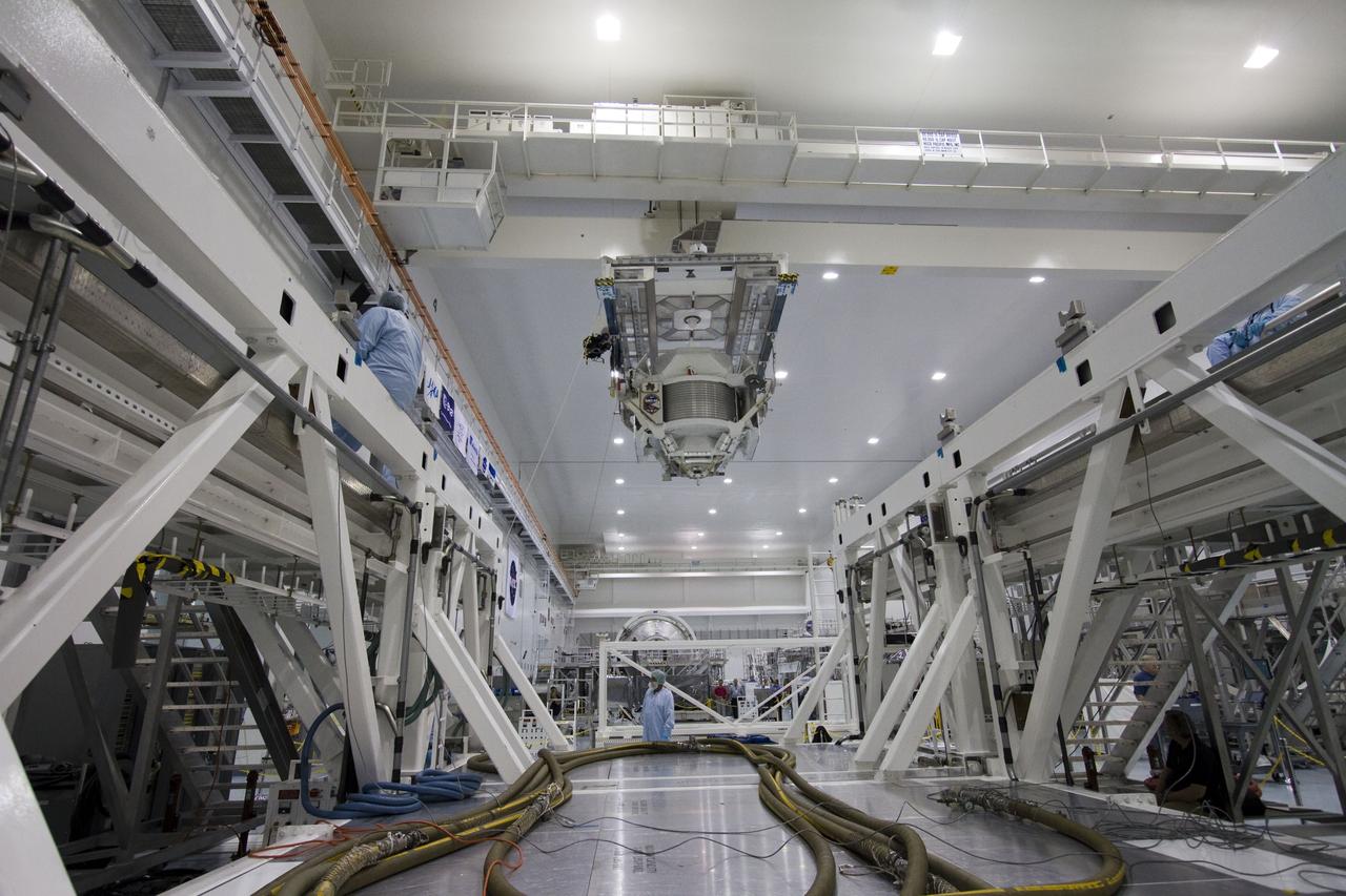 CAPE CANAVERAL, Fla. -- In the Space Station Processing Facility at NASA's Kennedy Space Center in Florida, the Alpha Magnetic Spectrometer-2 (AMS) moves from its primary work stand to the weight and center of gravity stand where final measurements will be taken before launch. Next, AMS will be moved into a payload canister. The canister will protect the space-bound payload on its journey to Launch Pad 39A, where it will later be installed into space shuttle Endeavour’s payload bay. AMS is a particle physics detector, designed to operate as an external experiment on the International Space Station. It will use the unique environment of space to study the universe and its origin by searching for dark matter. AMS-2 will fly to the station aboard Endeavour's STS-134 mission targeted to launch April 19 at 7:48 p.m. EDT. For more information visit, www.nasa.gov/mission_pages/shuttle/shuttlemissions/sts134/index.html. Photo credit: NASA/Jack Pfaller