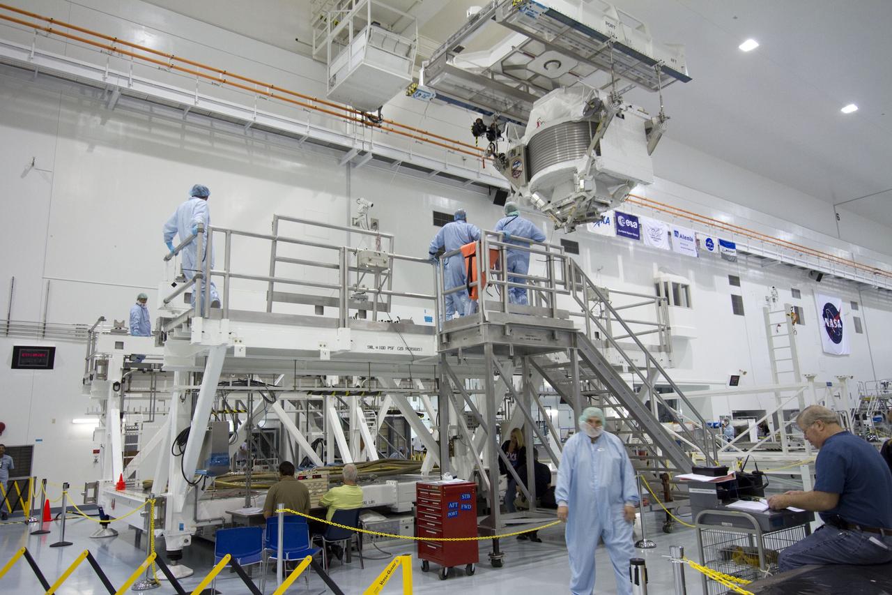 CAPE CANAVERAL, Fla. -- In the Space Station Processing Facility at NASA's Kennedy Space Center in Florida, the Alpha Magnetic Spectrometer-2 (AMS) moves from its primary work stand to the weight and center of gravity stand where final measurements will be taken before launch. Next, AMS will be moved into a payload canister. The canister will protect the space-bound payload on its journey to Launch Pad 39A, where it will later be installed into space shuttle Endeavour’s payload bay. AMS is a particle physics detector, designed to operate as an external experiment on the International Space Station. It will use the unique environment of space to study the universe and its origin by searching for dark matter. AMS-2 will fly to the station aboard Endeavour's STS-134 mission targeted to launch April 19 at 7:48 p.m. EDT. For more information visit, www.nasa.gov/mission_pages/shuttle/shuttlemissions/sts134/index.html. Photo credit: NASA/Jack Pfaller