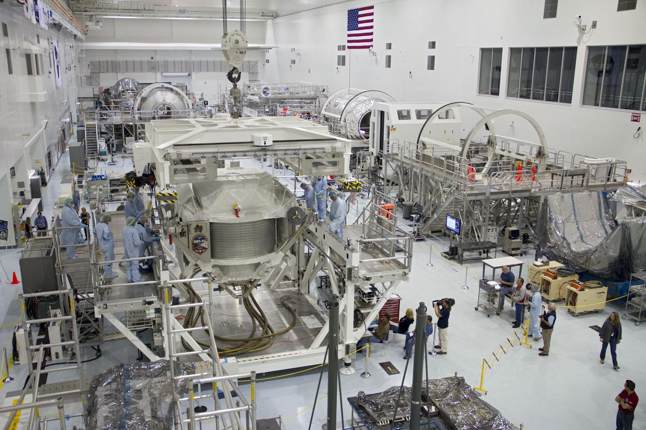 CAPE CANAVERAL, Fla. -- In the Space Station Processing Facility at NASA's Kennedy Space Center in Florida, the Alpha Magnetic Spectrometer-2 (AMS) was moved from its primary work stand to the weight and center of gravity stand where final measurements will be taken before launch. Next, AMS will be moved into a payload canister. The canister will protect the space-bound payload on its journey to Launch Pad 39A, where it will later be installed into space shuttle Endeavour’s payload bay.      AMS is a particle physics detector, designed to operate as an external experiment on the International Space Station. It will use the unique environment of space to study the universe and its origin by searching for dark matter. AMS-2 will fly to the station aboard Endeavour's STS-134 mission targeted to launch April 19 at 7:48 p.m. EDT. For more information visit, www.nasa.gov/mission_pages/shuttle/shuttlemissions/sts134/index.html. Photo credit: NASA/Jack Pfaller