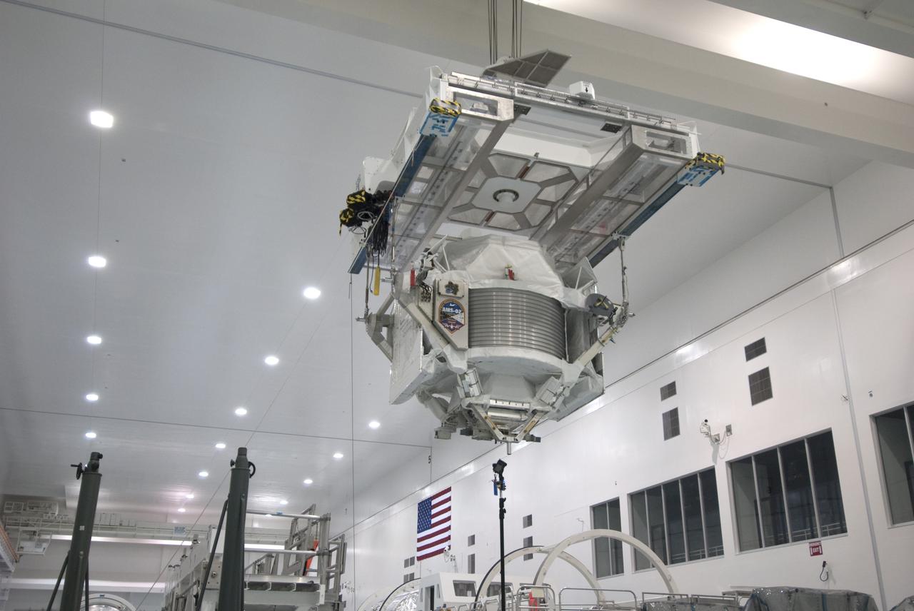 CAPE CANAVERAL, Fla. -- In the Space Station Processing Facility at NASA's Kennedy Space Center in Florida, the Alpha Magnetic Spectrometer-2 (AMS) is moved from the weight and center of gravity stand, where final measurements were taken before launch, to a payload canister. The canister will protect the space-bound payload on its journey to Launch Pad 39A, where it will later be installed into space shuttle Endeavour’s payload bay. AMS is a particle physics detector, designed to operate as an external experiment on the International Space Station. It will use the unique environment of space to study the universe and its origin by searching for dark matter. AMS-2 will fly to the station aboard Endeavour's STS-134 mission targeted to launch April 19 at 7:48 p.m. EDT. For more information visit, www.nasa.gov/mission_pages/shuttle/shuttlemissions/sts134/index.html. Photo credit: NASA/Jim Grossmann