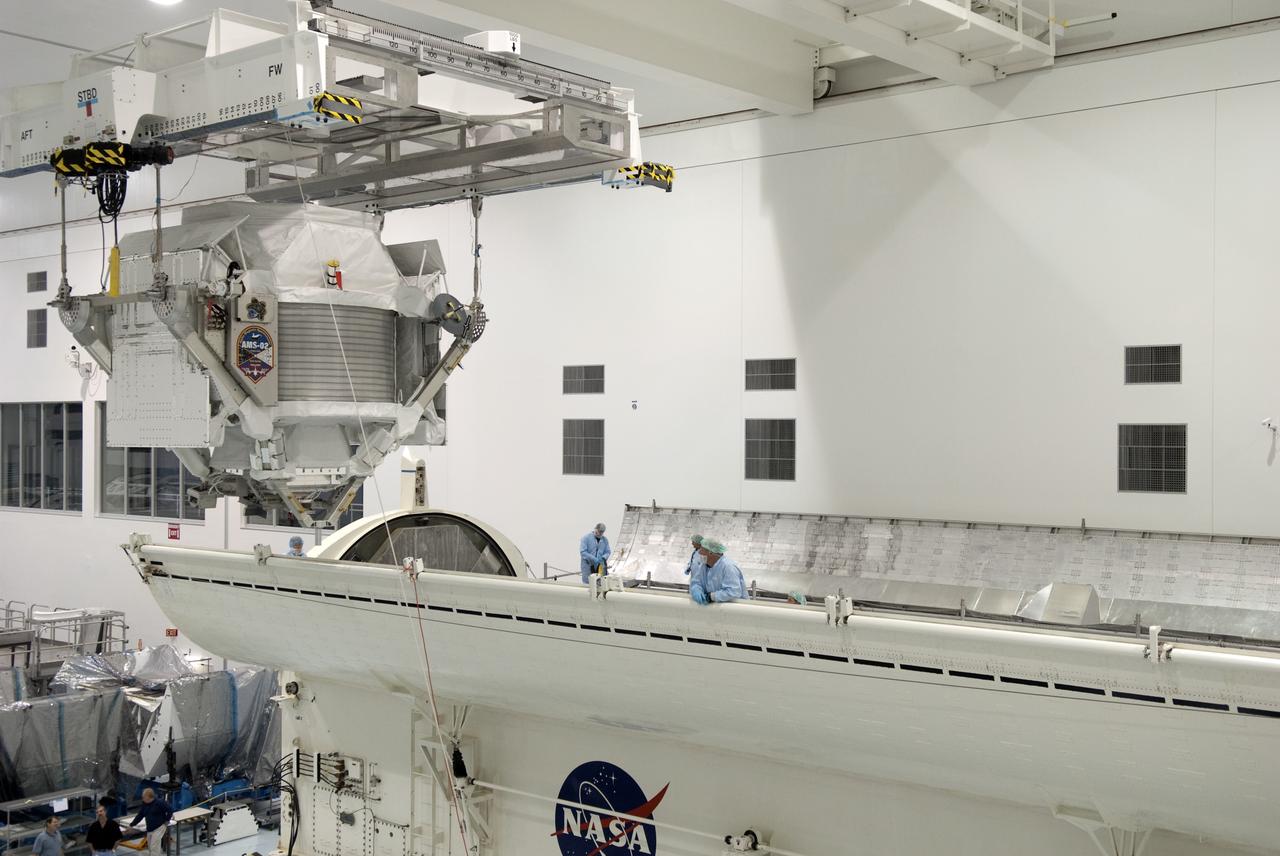 CAPE CANAVERAL, Fla. -- In the Space Station Processing Facility at NASA's Kennedy Space Center in Florida, the Alpha Magnetic Spectrometer-2 (AMS) is moved from the weight and center of gravity stand, where final measurements were taken before launch, to a payload canister. The canister will protect the space-bound payload on its journey to Launch Pad 39A, where it will later be installed into space shuttle Endeavour’s payload bay. AMS is a particle physics detector, designed to operate as an external experiment on the International Space Station. It will use the unique environment of space to study the universe and its origin by searching for dark matter. AMS-2 will fly to the station aboard Endeavour's STS-134 mission targeted to launch April 19 at 7:48 p.m. EDT. For more information visit, www.nasa.gov/mission_pages/shuttle/shuttlemissions/sts134/index.html. Photo credit: NASA/Jim Grossmann