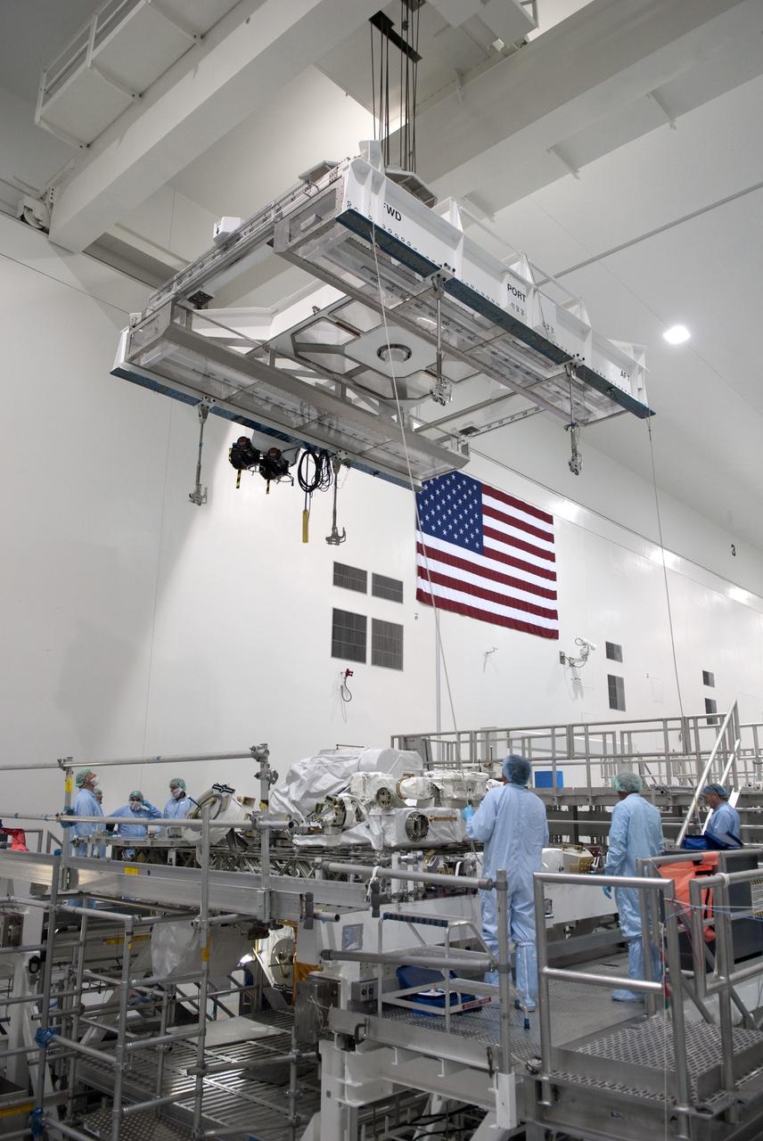 CAPE CANAVERAL, Fla. -- In the Space Station Processing Facility at NASA's Kennedy Space Center in Florida, technicians prepare Express Logistics Carrier-3 for the move from its primary work stand to a payload canister. The canister will protect the space-bound payload on its journey to Launch Pad 39A, where it will later be installed into space shuttle Endeavour’s payload bay. ELC-3 is packed with a variety of spare parts for the International Space Station, including two S-band communications antennas, a high-pressure gas tank, additional spare parts for Dextre and micrometeoroid debris shields. ELC-3 will fly to the station aboard Endeavour's STS-134 mission targeted to launch April 19 at 7:48 p.m. EDT. For more information visit, www.nasa.gov/mission_pages/shuttle/shuttlemissions/sts134/index.html. Photo credit: NASA/Jim Grossmann