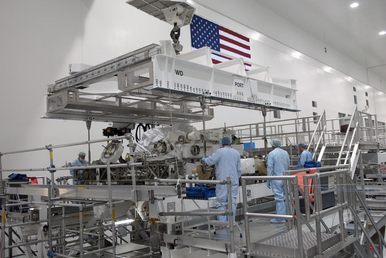 CAPE CANAVERAL, Fla. -- In the Space Station Processing Facility at NASA's Kennedy Space Center in Florida, technicians prepare Express Logistics Carrier-3 for the move from its primary work stand to a payload canister. The canister will protect the space-bound payload on its journey to Launch Pad 39A, where it will later be installed into space shuttle Endeavour’s payload bay. ELC-3 is packed with a variety of spare parts for the International Space Station, including two S-band communications antennas, a high-pressure gas tank, additional spare parts for Dextre and micrometeoroid debris shields. ELC-3 will fly to the station aboard Endeavour's STS-134 mission targeted to launch April 19 at 7:48 p.m. EDT. For more information visit, www.nasa.gov/mission_pages/shuttle/shuttlemissions/sts134/index.html. Photo credit: NASA/Jim Grossmann