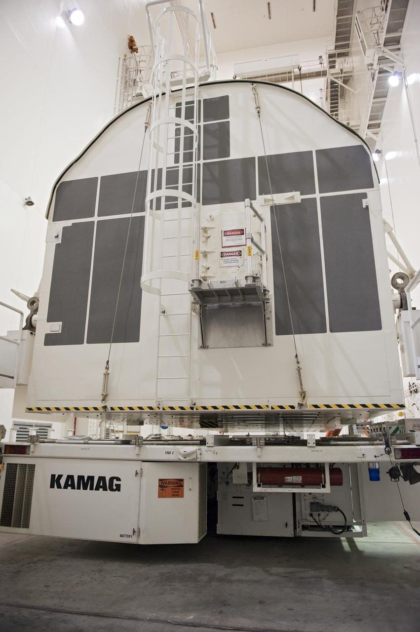 CAPE CANAVERAL, Fla. -- A canister, carrying the Alpha Magnetic Spectrometer-2 AMS and Express Logistics Carrier-3 for space shuttle Endeavour's STS-134 mission, is in the Canister Rotation Facility at NASA's Kennedy Space Center in Florida. There, the canister that protects the space-bound payload will be rotated from a horizontal to vertical position so that it can be installed into Endeavour's payload bay. AMS is a particle physics detector, designed to operate as an external experiment on the International Space Station. It will use the unique environment of space to study the universe and its origin by searching for dark matter. AMS-2 will fly to the station aboard Endeavour's STS-134 mission targeted to launch April 19 at 7:48 p.m. EDT. For more information visit, www.nasa.gov/mission_pages/shuttle/shuttlemissions/sts134/index.html. Photo credit: NASA/Kim Shiflett