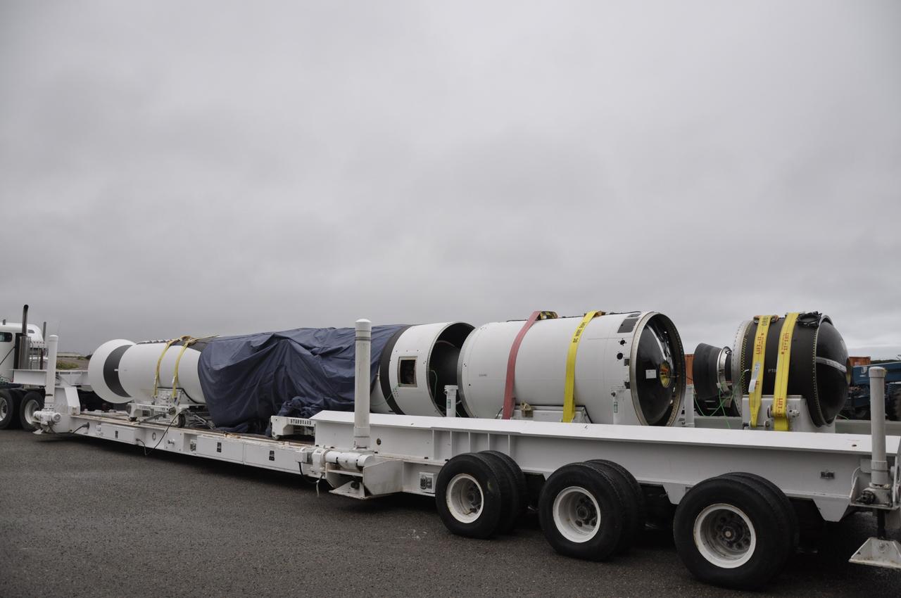 VANDENBERG AIR FORCE BASE, Calif. -- The first, second and third stages of the Orbital Sciences Corp. Pegasus XL rocket that will launch the Nuclear Spectroscopic Telescope Array (NuSTAR) to orbit are moved from the west high bay to the east high bay of Building 1555 at Vandenberg Air Force Base in California. The move will allow technicians to process the spacecraft and fairing in the clean rooms of the east high bay before attaching it to the rocket. After the rocket and spacecraft are processed at Vandenberg, they will be flown on the Orbital Sciences' L-1011 carrier aircraft to the Ronald Reagan Ballistic Missile Defense Test Site located at the Pacific Ocean’s Kwajalein Atoll for launch. The high-energy X-ray telescope will conduct a census for black holes, map radioactive material in young supernovae remnants, and study the origins of cosmic rays and the extreme physics around collapsed stars. Photo credit: NASA/Randy Beaudoin, VAFB