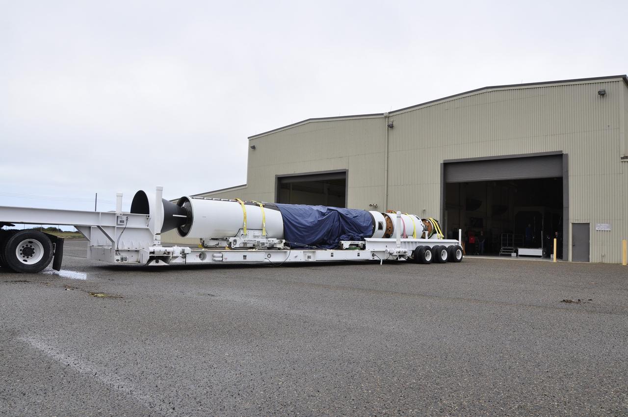 VANDENBERG AIR FORCE BASE, Calif. -- The first, second and third stages of the Orbital Sciences Corp. Pegasus XL rocket that will launch the Nuclear Spectroscopic Telescope Array NuSTAR to orbit are moved from the west high bay to the east high bay of Building 1555 at Vandenberg Air Force Base in California. The move will allow technicians to process the spacecraft and fairing in the clean rooms of the east high bay before attaching it to the rocket. After the rocket and spacecraft are processed at Vandenberg, they will be flown on the Orbital Sciences' L-1011 carrier aircraft to the Ronald Reagan Ballistic Missile Defense Test Site located at the Pacific Ocean’s Kwajalein Atoll for launch. The high-energy X-ray telescope will conduct a census for black holes, map radioactive material in young supernovae remnants, and study the origins of cosmic rays and the extreme physics around collapsed stars. Photo credit: NASA/Randy Beaudoin, VAFB