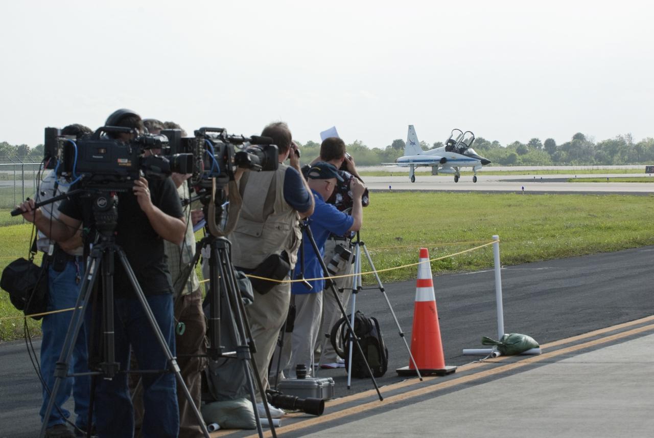 CAPE CANAVERAL, Fla. -- Media snap photos and record the arrival of space shuttle Endeavour's STS-134 crew members on the Shuttle Landing Facility at NASA's Kennedy Space Center in Florida. While at Kennedy, Endeavour's crew will participate in a launch countdown dress rehearsal called the Terminal Countdown Demonstration Test (TCDT) and related training in preparation for the upcoming STS-134 mission.     Endeavour and its six STS-134 crew members will deliver the Express Logistics Carrier-3, Alpha Magnetic Spectrometer-2 (AMS), a high-pressure gas tank, additional spare parts for the Dextre robotic helper and micrometeoroid debris shields to the International Space Station. This will be the final spaceflight for Endeavour. Launch is targeted for April 19 at 7:48 p.m. EDT. For more information visit, www.nasa.gov/mission_pages/shuttle/shuttlemissions/sts134/index.html. Photo credit: NASA/Kim Shiflett