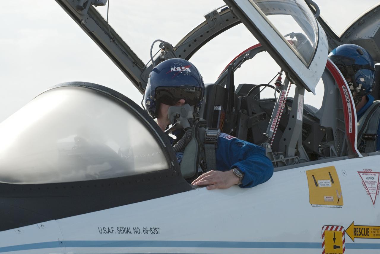 CAPE CANAVERAL, Fla. -- STS-134 Pilot Greg H. Johnson, left, and Mission Specialist Roberto Vittori, with the European Space Agency, arrive on the Shuttle Landing Facility at NASA's Kennedy Space Center in Florida aboard a T-38 jet. While at Kennedy, space shuttle Endeavour's crew will participate in a launch countdown dress rehearsal called the Terminal Countdown Demonstration Test (TCDT) and related training in preparation for the upcoming STS-134 mission. Endeavour and its six STS-134 crew members will deliver the Express Logistics Carrier-3, Alpha Magnetic Spectrometer-2 (AMS), a high-pressure gas tank, additional spare parts for the Dextre robotic helper and micrometeoroid debris shields to the International Space Station. This will be the final spaceflight for Endeavour. Launch is targeted for April 19 at 7:48 p.m. EDT. For more information visit, www.nasa.gov/mission_pages/shuttle/shuttlemissions/sts134/index.html. Photo credit: NASA/Kim Shiflett