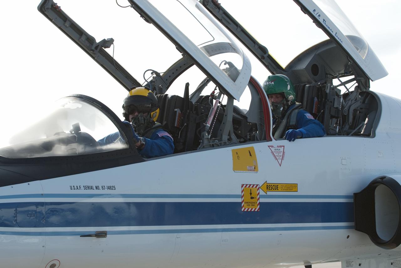 CAPE CANAVERAL, Fla. -- STS-134 Commander Mark Kelly, left, and Mission Specialist Michael Fincke arrive on the Shuttle Landing Facility at NASA's Kennedy Space Center in Florida aboard a T-38 jet. While at Kennedy, space shuttle Endeavour's crew will participate in a launch countdown dress rehearsal called the Terminal Countdown Demonstration Test (TCDT) and related training in preparation for the upcoming STS-134 mission. Endeavour and its six STS-134 crew members will deliver the Express Logistics Carrier-3, Alpha Magnetic Spectrometer-2 (AMS), a high-pressure gas tank, additional spare parts for the Dextre robotic helper and micrometeoroid debris shields to the International Space Station. This will be the final spaceflight for Endeavour. Launch is targeted for April 19 at 7:48 p.m. EDT. For more information visit, www.nasa.gov/mission_pages/shuttle/shuttlemissions/sts134/index.html. Photo credit: NASA/Kim Shiflett